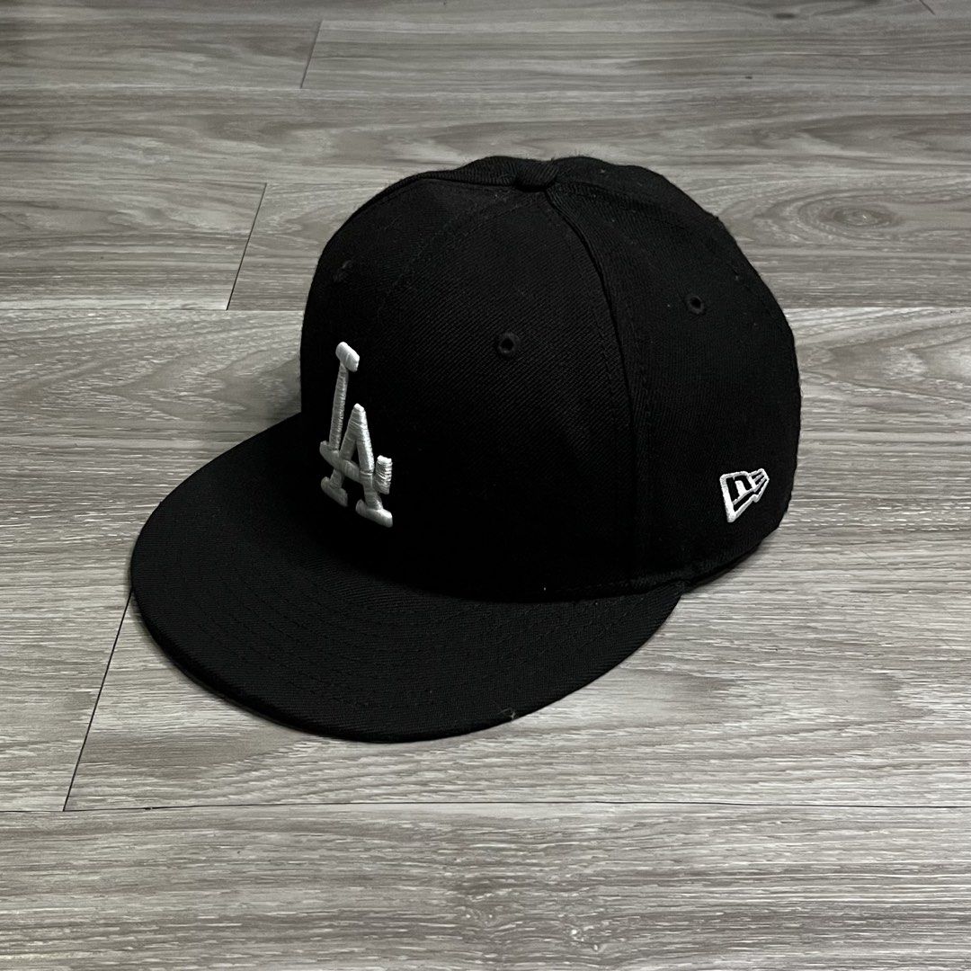 New Era LA Dodgers Black Close Cap (Category: Caps & Hats) located in Cebu City. Submitted by specializedgoodsitem_ (Listing ID 1457317620, Image 3). Description: excellent condition details posted color may vary due to light size 7 1/4.