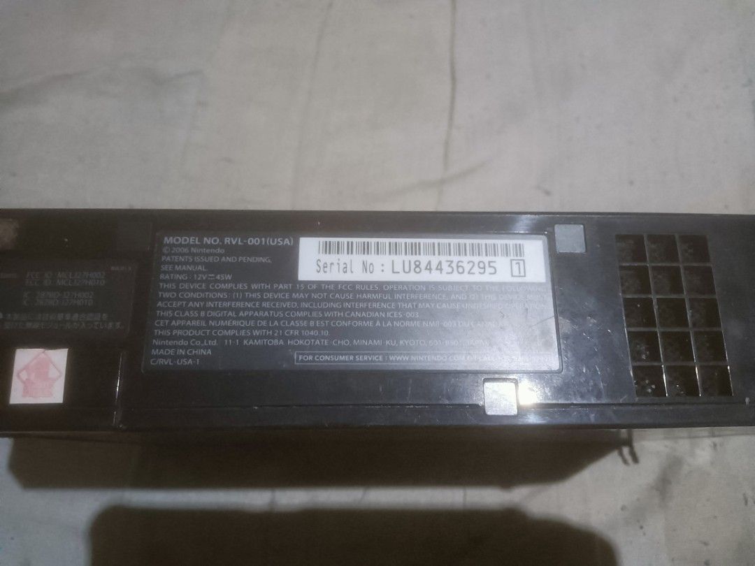 Nintendo Wii RVL-001 Console (Category: Nintendo) located in Bulacan. Submitted by carou13325 (Listing ID 1457188699, Image 3). Description: - Black Nintendo Wii Console (Model RVL-001) - Features USB ports for expanded functionality - Built-in fan vent for optimal performance - Front panel includes Wii logo, power, reset, and eject buttons - Serial Number: LU84436295 - USA Region - UNTESTED!!! , No cables to test. Good for technicians and collec