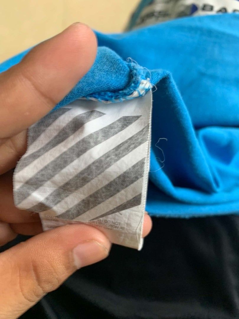Off white (Category: Activewear) located in Manila. Submitted by thriftgoodsarchive3 (Listing ID 1457268470, Image 3). Description: width 20 length 27 issue re tag I replaced the vintages tag of nike.