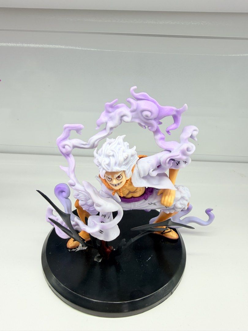One Piece Monkey D. Luffy Gear Figure (Category: Figurines & Statues) located in Manila. Submitted by jpal4141 (Listing ID 1457254410, Image 1). Description: - Gear 5 Monkey D. Luffy figure - Dynamic purple smoke effects - Mounted on a black circular base - Ideal for One Piece collectors - No original box included - 3-5 inches .