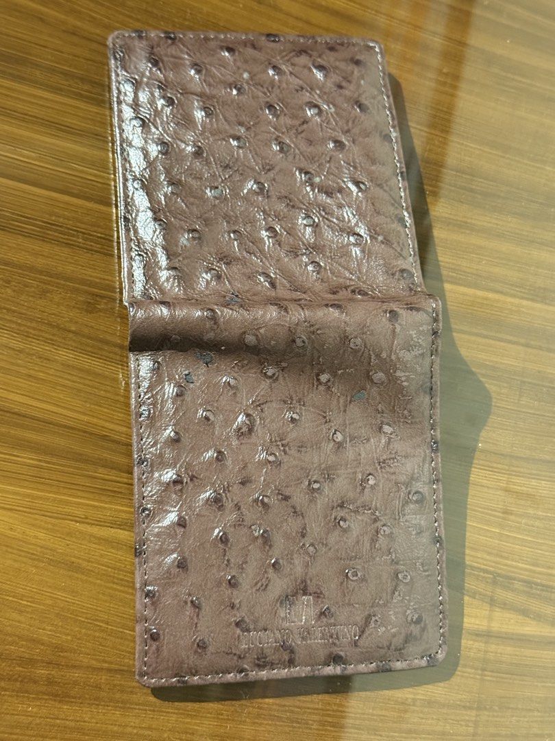 Ostrich leather wallet (Category: Luxury Bags & Wallets) located in Taguig. Submitted by jhonnybusinessph (Listing ID 1457175600, Image 2). Description: Wts Ostrich leather wallet Color Brown In very good condition With minimal sign of usage See picture Selling as is .