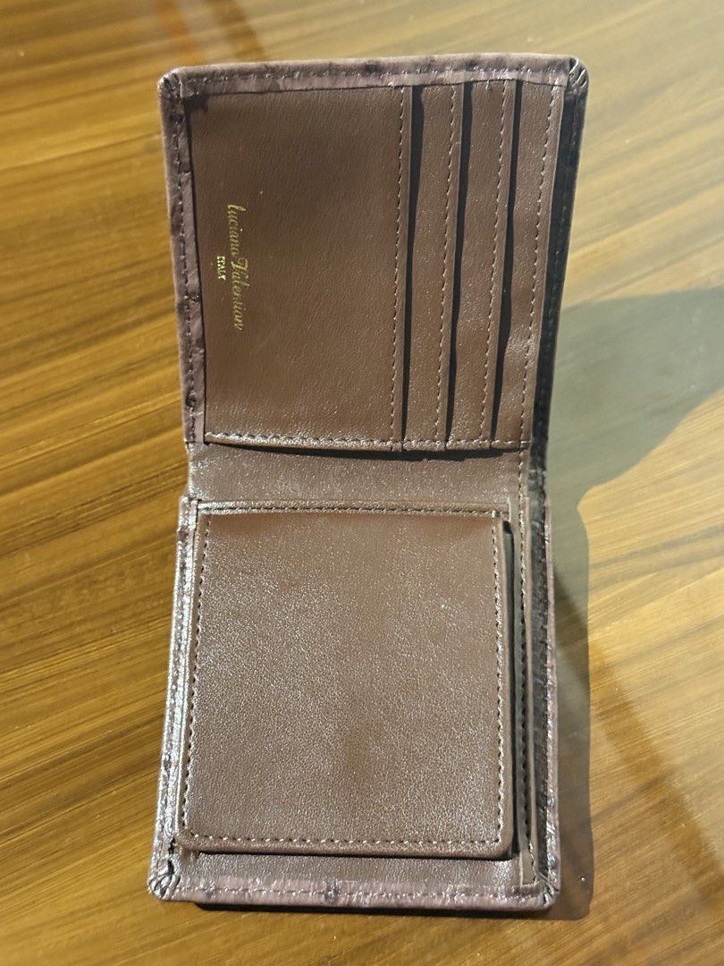 Ostrich leather wallet (Category: Luxury Bags & Wallets) located in Taguig. Submitted by jhonnybusinessph (Listing ID 1457175600, Image 3). Description: Wts Ostrich leather wallet Color Brown In very good condition With minimal sign of usage See picture Selling as is .