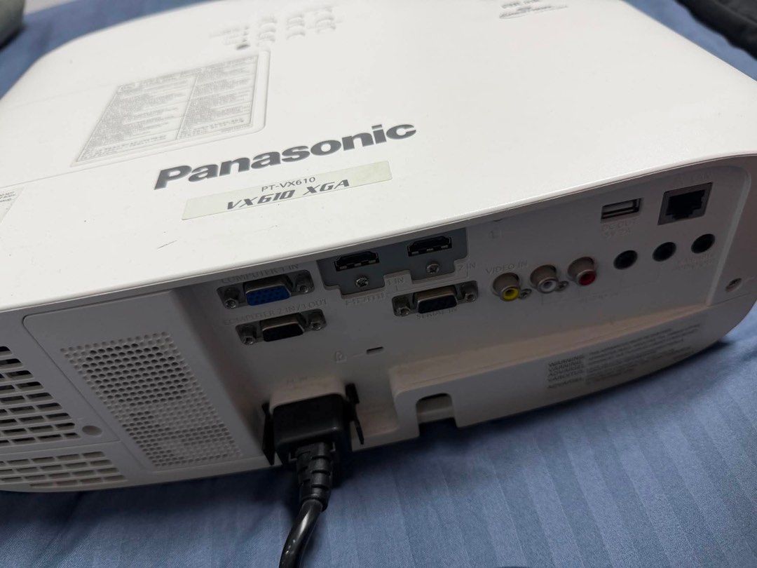 Panasonic PT-VX610 XGA Projector (Category: Projectors) located in Cavite. Submitted by bajoy__ (Listing ID 1457271673, Image 2). Description: - Panasonic PT-VX610 Projector - XGA Resolution - 5,500 ANSI Lumens - 16,000:1 Contrast Ratio - 5,000 hours (Normal) / up to 7,000 Lamp life - Built-in 10W monaural speaker - HDMI, VGA, and other input ports - Ideal for presentations and home theater - Power cable included Note: No Box .