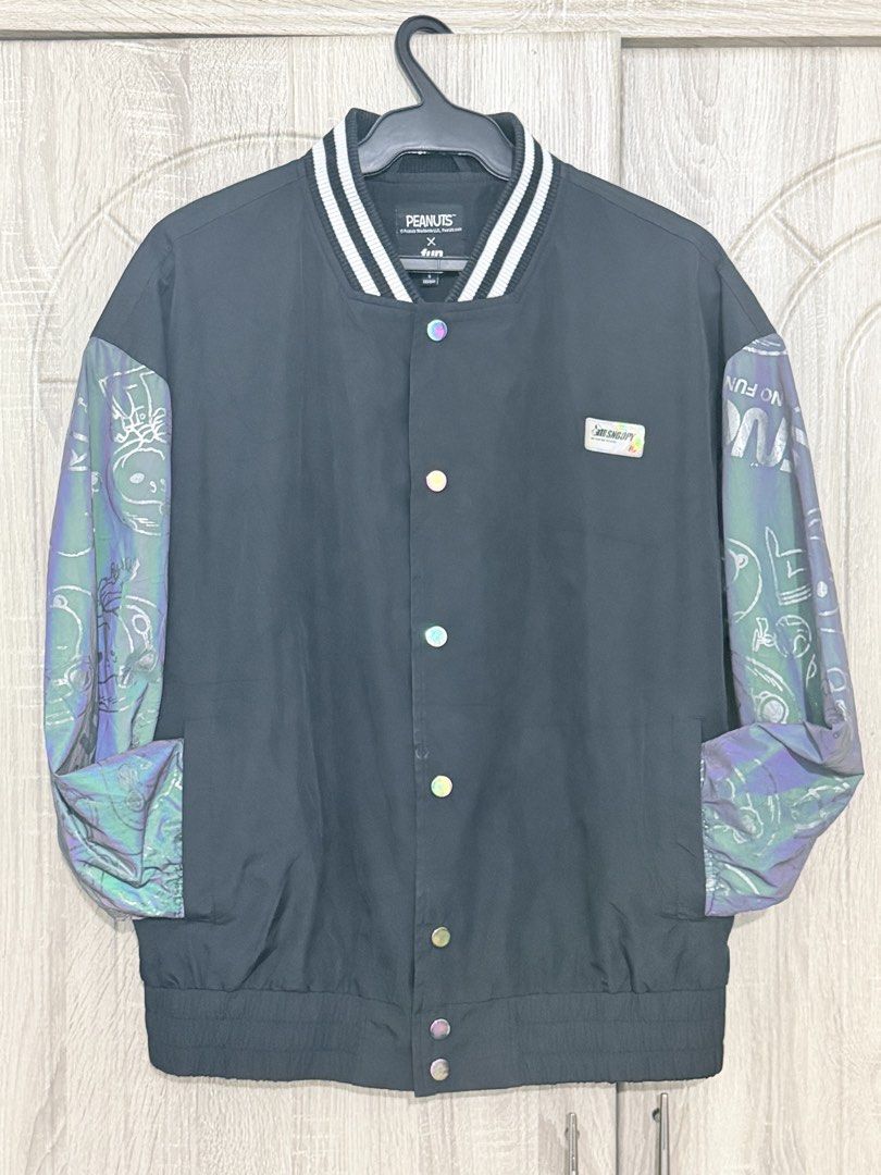 Peanuts Snoopy Bomber Jacket (Category: Coats, Jackets and Outerwear) located in Pasig City. Submitted by iambernabe (Listing ID 1457195452, Image 2). Description: - Cool Snoopy bomber jacket - "No Fun No Future" graphic on the back - Reflective sleeves with Snoopy graphics - Button-up front with pockets - Ribbed collar, cuffs, and hem - Ideal for casual wear Fits Small to Medium.