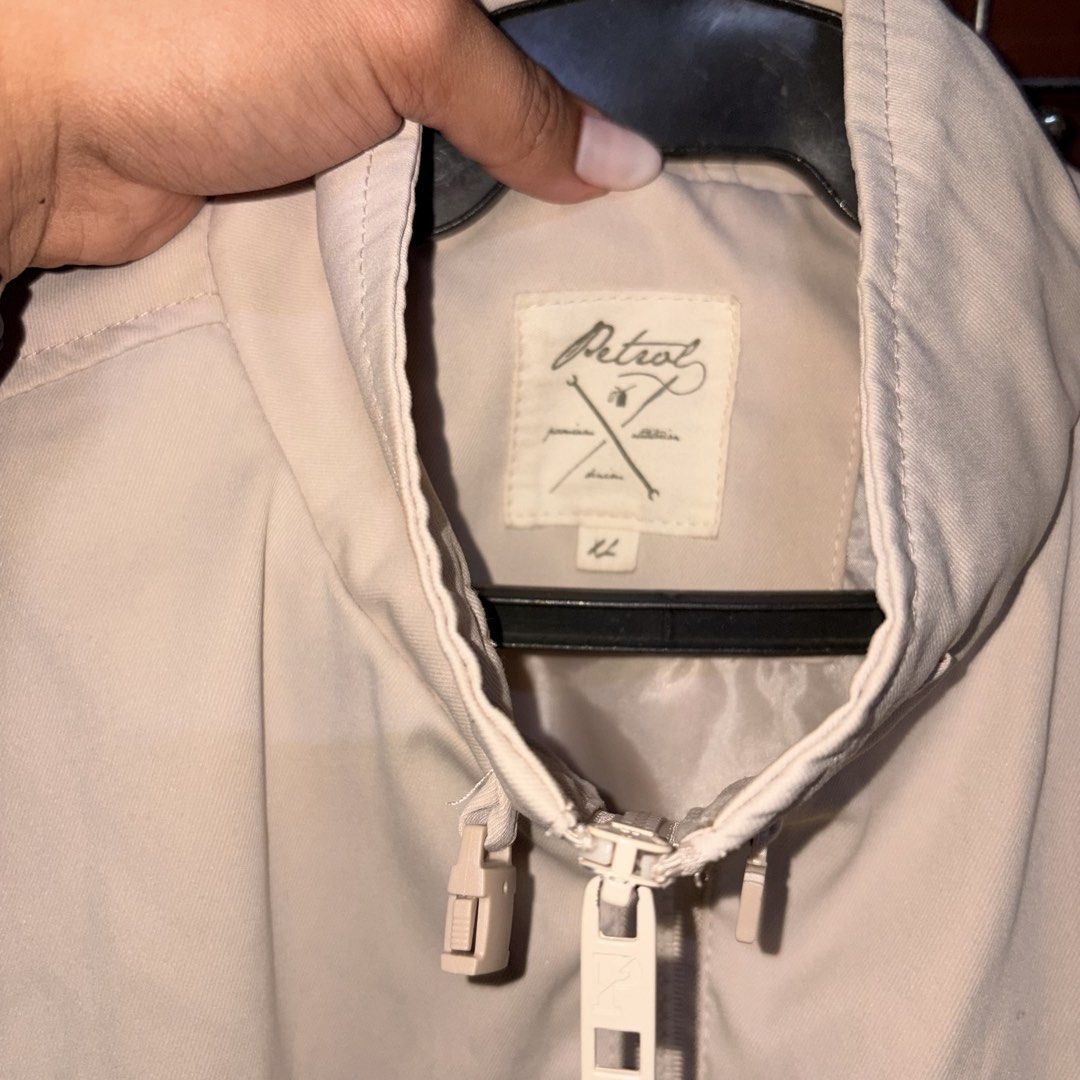 Petrol Beige Jacket (Category: Coats, Jackets and Outerwear) located in Manila. Submitted by ciiii1 (Listing ID 1457308506, Image 2). Description: Size: XL Color: Beige / Cream Brand: Petrol Industries Quick Details: Full-zip front closure with mock neck collar Front utility pockets with button flaps Elasticized hem and cuffs for a comfortable fit Clean aesthetic with subtle chest logo patch .