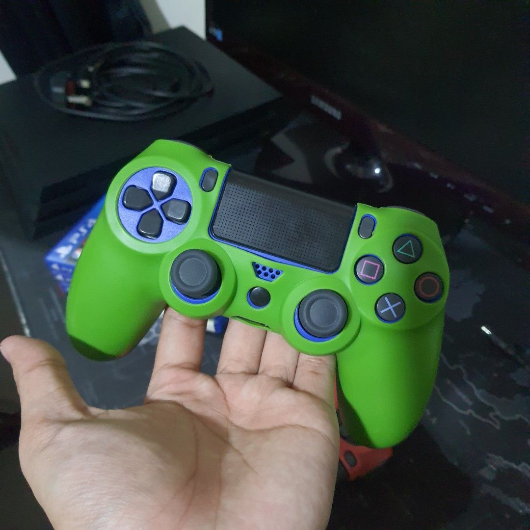 PlayStation 4 Pro 1tb 13.5firmware Console with 2 Controllers & Games (Category: PlayStation) located in Las Pinas. Submitted by gabbuencam69723 (Listing ID 1457202829, Image 3). Description: - PS4 Pro 1tb Console - 2 DualShock 4 Controllers (1 Red, 1 Green) - 3 Games Included: NBA 2K25, Tekken 7, Harvest Moon: Light of Hope Special Edition - All Necessary Cables Included - Ready for immediate gaming!.