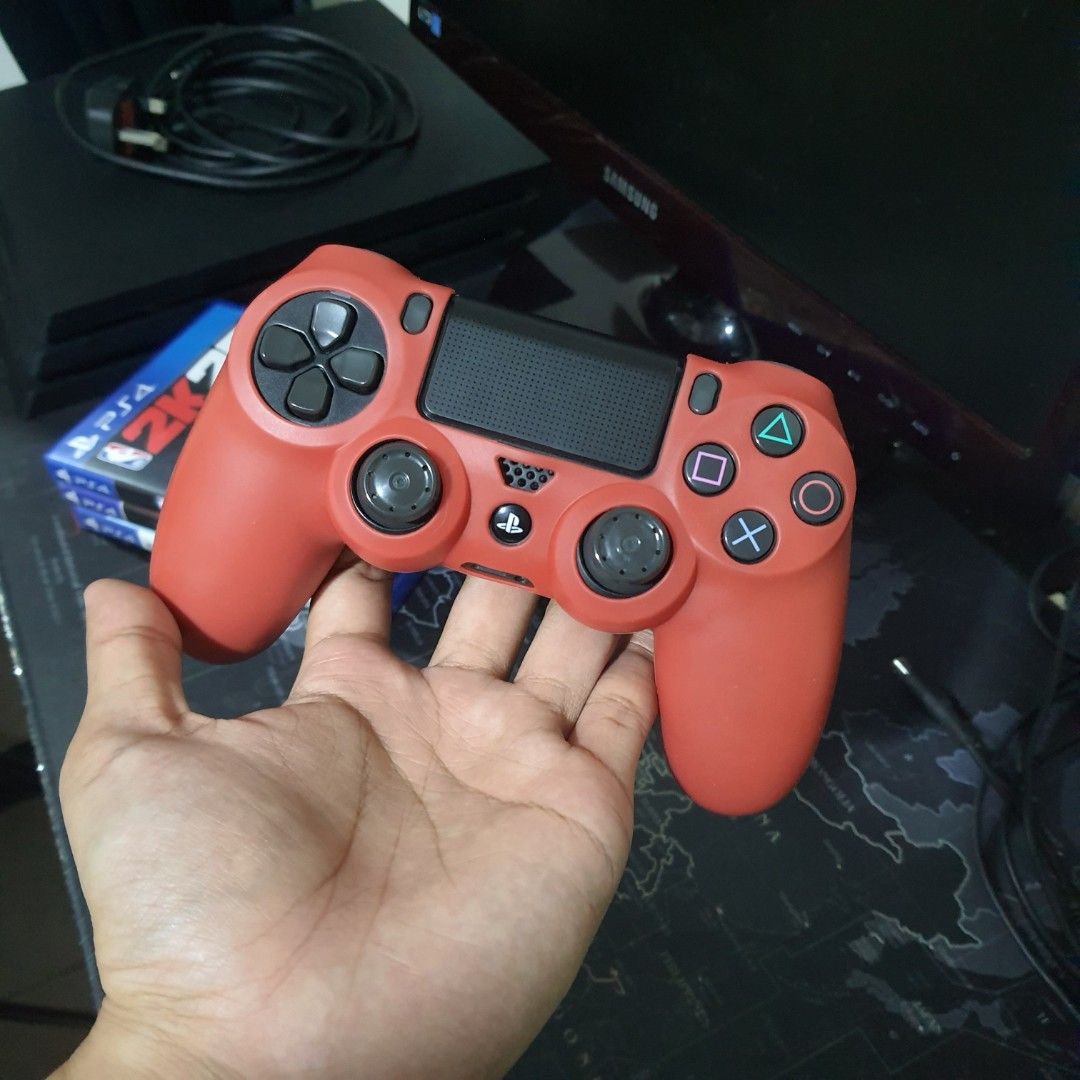 PlayStation 4 Pro 1tb 13.5firmware Console with 2 Controllers & Games (Category: PlayStation) located in Las Pinas. Submitted by gabbuencam69723 (Listing ID 1457202829, Image 2). Description: - PS4 Pro 1tb Console - 2 DualShock 4 Controllers (1 Red, 1 Green) - 3 Games Included: NBA 2K25, Tekken 7, Harvest Moon: Light of Hope Special Edition - All Necessary Cables Included - Ready for immediate gaming!.