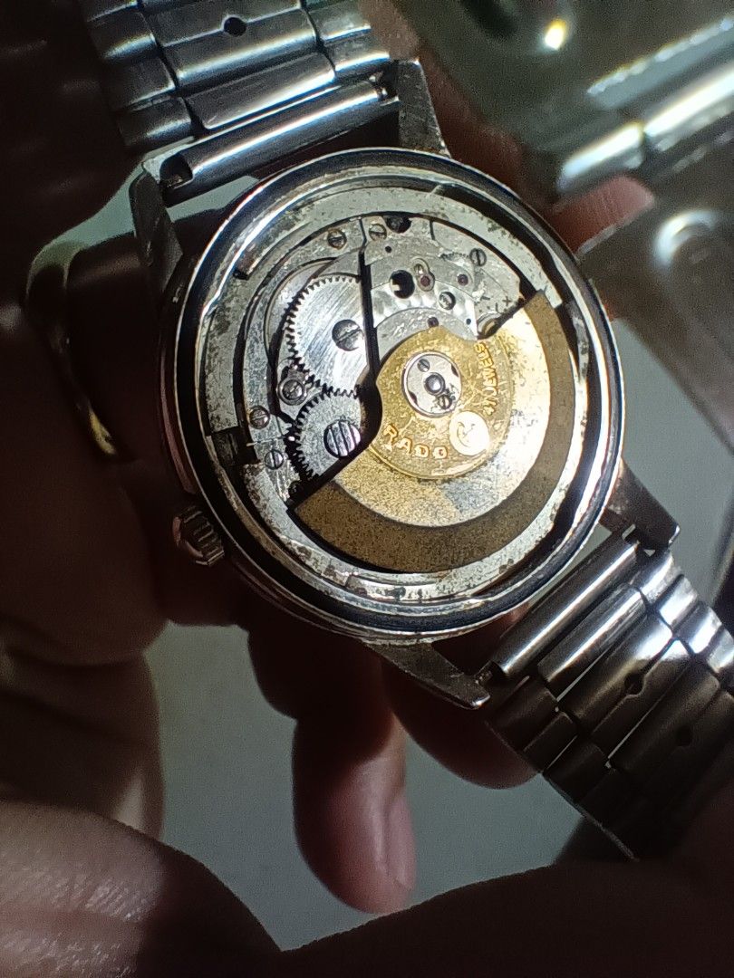 Rado Day/Date Automatic Watch (Category: Luxury Watches) located in Panabo. Submitted by markgementiza18 (Listing ID 1457261339, Image 3). Description: - Vintage Rado Automatic Watch - Day and Date Function - Stainless Steel Bracelet - Signs of wear consistent with age - Patina on Dial - Visible movement through case back - Ideal for watch collectors -After Market bracelet.