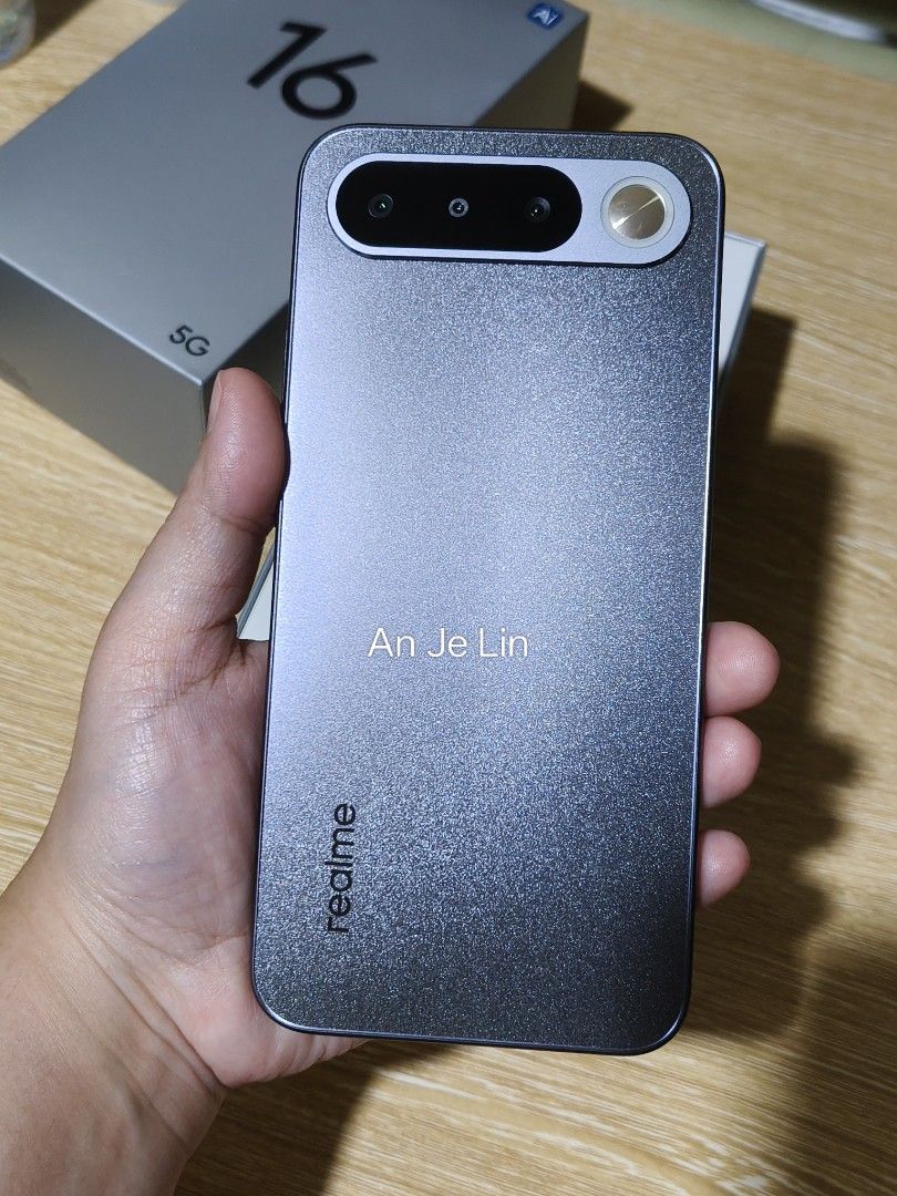 realme 16 5G (Category: Realme) located in Makati City. Submitted by anjelincloset (Listing ID 1457204354, Image 3). Description: Realme 16 5G, Air Black. 8GB RAM, 256GB Storage. Large 6000mAh battery. SRP: Php 28,999 Opened box to check unit and take photos. Complete inclusion, good as brandnew. Selling low for Php25,000 open for meet-up or pick-up only !!FOR SERIOUS BUYERS ONLY!!.