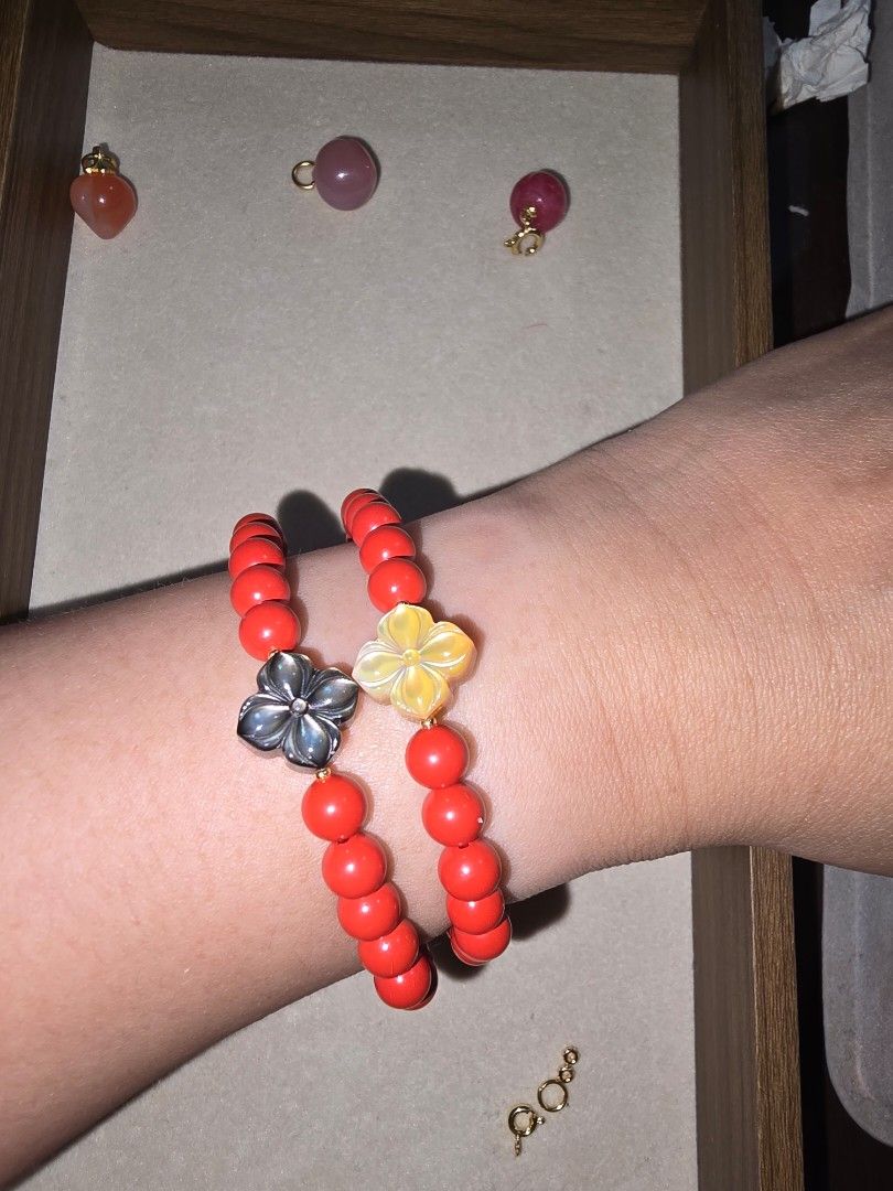 Red Cinnabar Bracelets with MOP Flower Charms (Category: Bracelets) located in Santa Rosa. Submitted by crystal1.0 (Listing ID 1457281019, Image 2). Description: 1. Cinnabar bracelet with Gold Mother of Pearl charm (clover shape). 2. Cinnabar bracelet with BlackMother of Pearl charm (clover shape). p650 each..