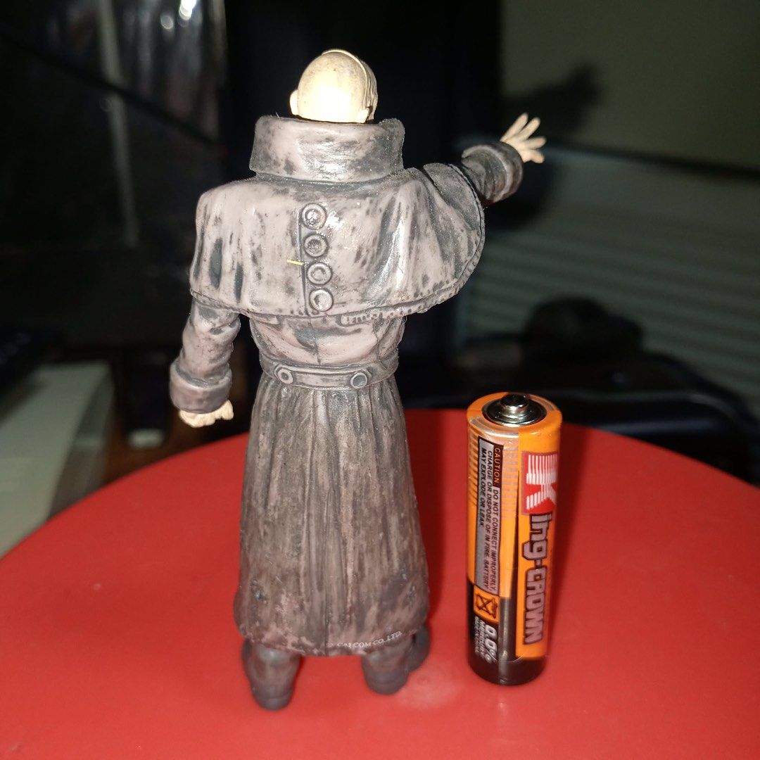 Resident Evil Action Figure (Category: Figurines & Statues) located in Binan City. Submitted by kariray_shop (Listing ID 1457150775, Image 2). Description: - Action figure of Wesker from Resident Evil - Battery included for size reference - Highly detailed coat and beard - Poseable arms for dynamic display - A must-have for Resident Evil fans!.