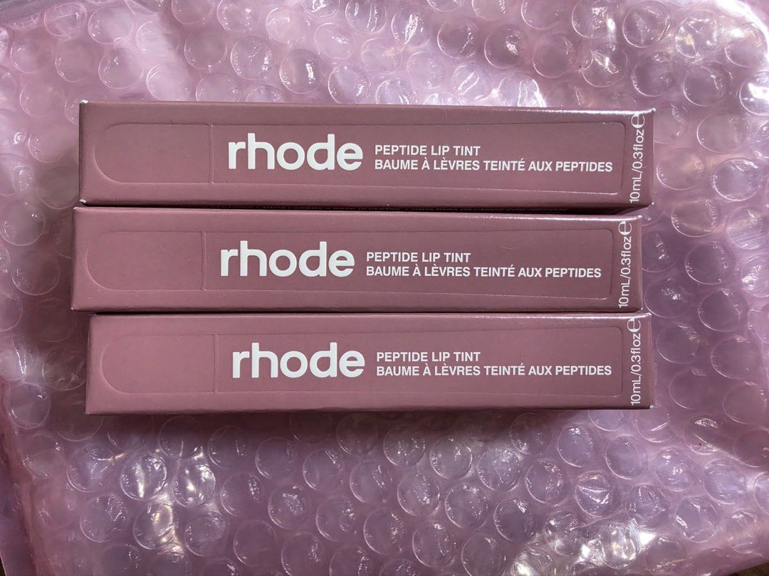 Rhode Lip Peptide Lip Tint (Category: Makeup) located in Pasig City. Submitted by peyuhnis (Listing ID 1457209177, Image 2). Description: on hand! shades available: ribbon pbj salty tan.