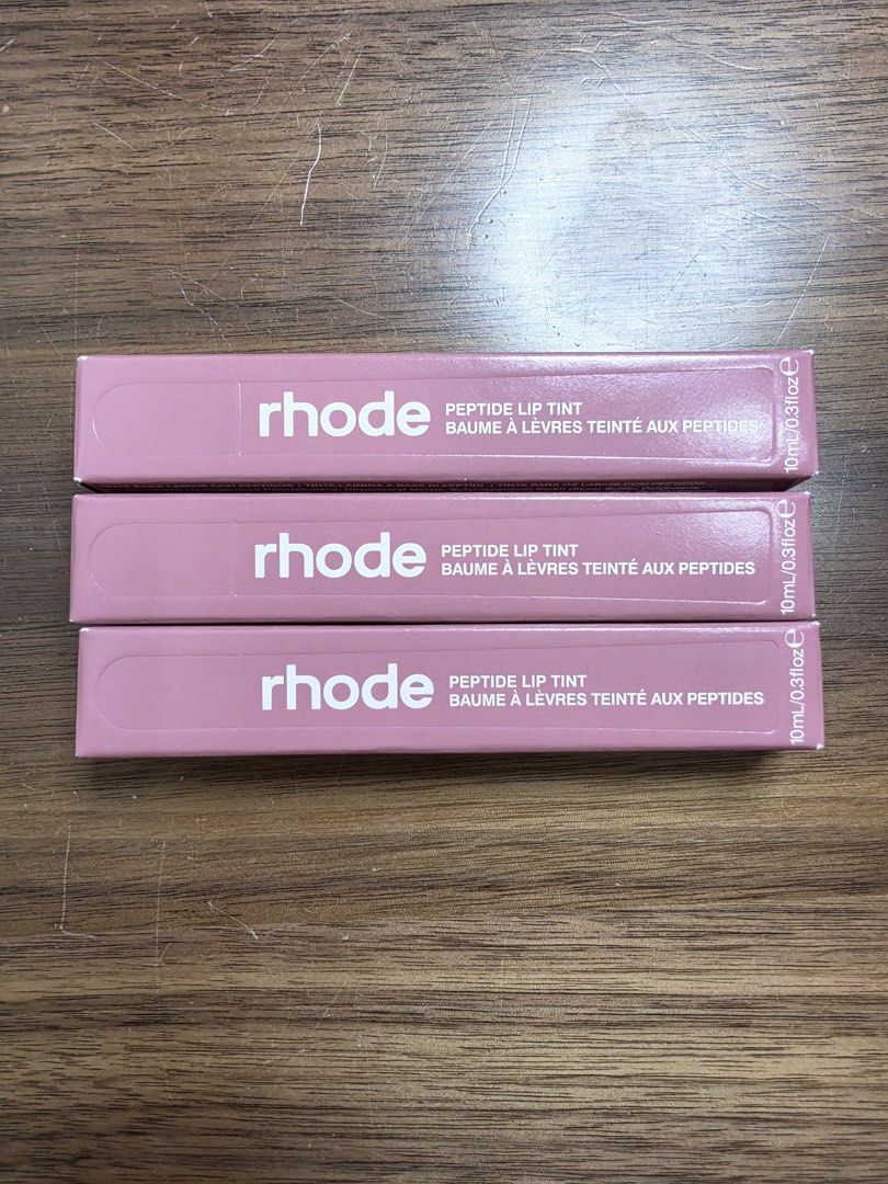 Rhode Lip Peptide Lip Tint (Category: Makeup) located in Pasig City. Submitted by peyuhnis (Listing ID 1457209177, Image 1). Description: on hand! shades available: ribbon pbj salty tan.