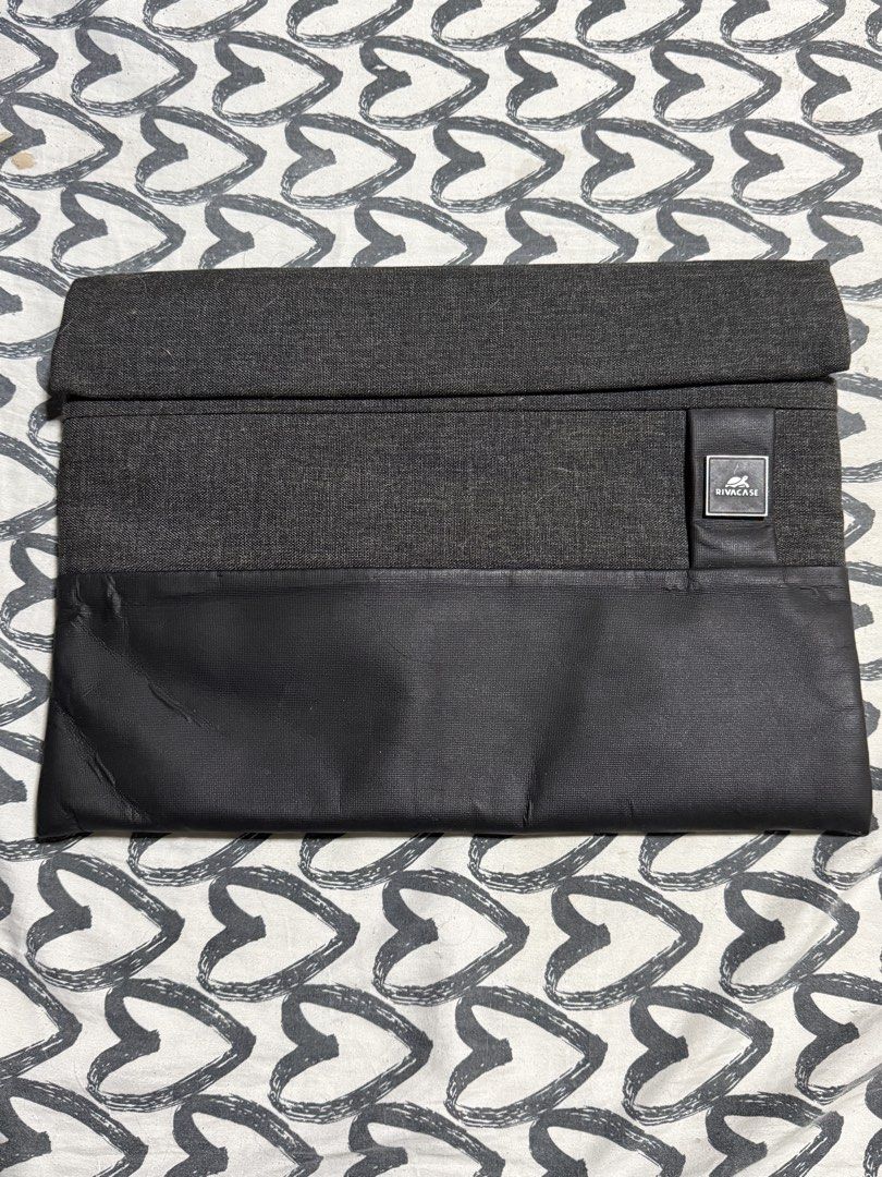 RIVACASE Grey Laptop Sleeve Pouch Bag (Category: Laptop Bags & Sleeves) located in Manila. Submitted by gooddealsmanila (Listing ID 1457285054, Image 1). Description: - Grey RIVACASE laptop sleeve - Zippered pocket on the back - Interior RIVACASE label with model number - Includes a 5-year extended warranty tag - Ideal for protecting your laptop while traveling Bought this for 2,190 .