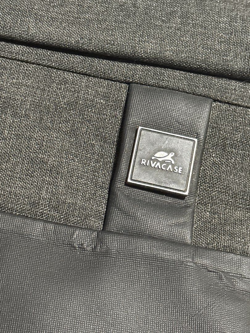 RIVACASE Grey Laptop Sleeve Pouch Bag (Category: Laptop Bags & Sleeves) located in Manila. Submitted by gooddealsmanila (Listing ID 1457285054, Image 2). Description: - Grey RIVACASE laptop sleeve - Zippered pocket on the back - Interior RIVACASE label with model number - Includes a 5-year extended warranty tag - Ideal for protecting your laptop while traveling Bought this for 2,190 .