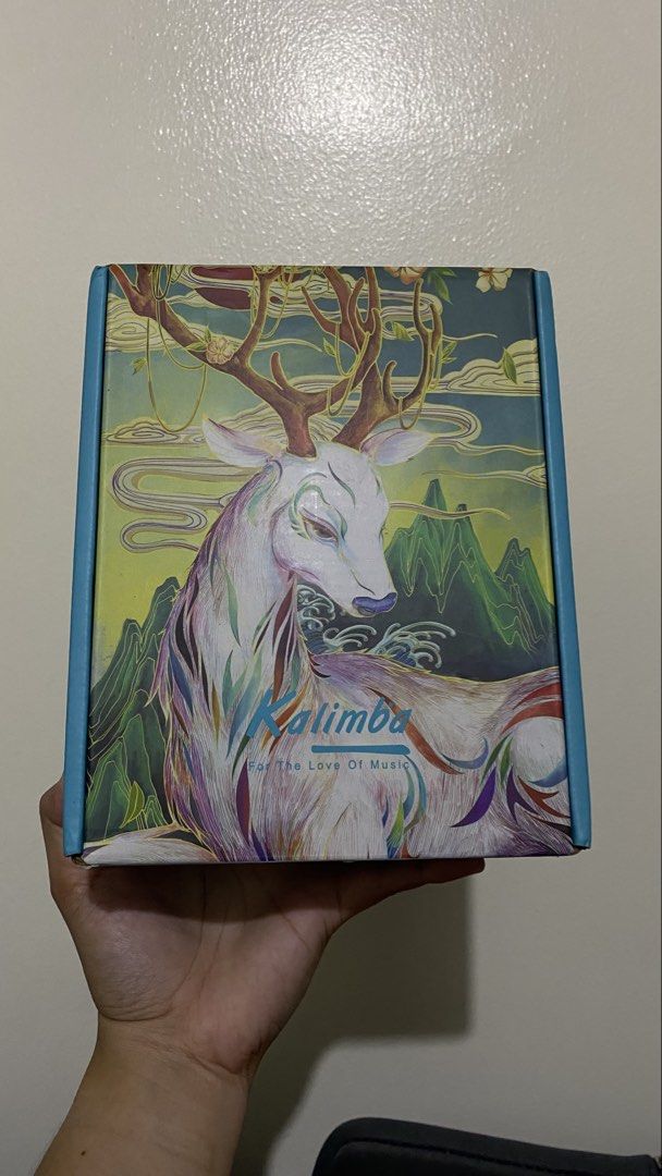 Rixton Kalimba 17 Keys <decluttering> (Category: Musical Instruments) located in Santa Rosa. Submitted by hadassa_grace (Listing ID 1457267893, Image 3). Description: - Rixton 17-key Kalimba - Made in China - Includes learning book - Includes tuning hammer - Decorative gift box with deer design - Ideal for beginners and aspiring musicians.