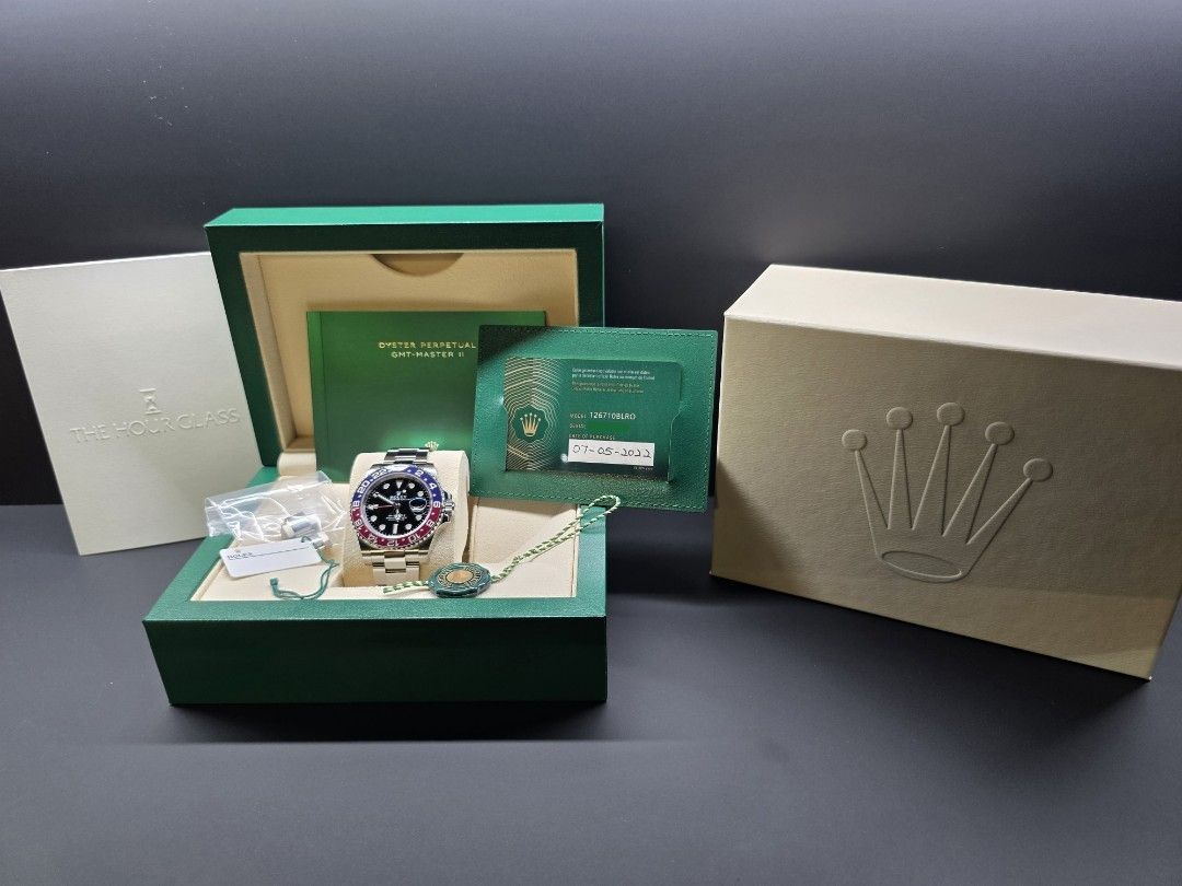 Rolex Oyster GMT-Master II 126710BLRO PEPSI (Category: Watches) located in Singapore. Submitted by KieferSutherland (Listing ID 1457301460, Image 2). Description: FIXED PRICE!!! - Rolex GMT-Master II - Reference: 126710BLRO - Bezel: Red & Blue 'Pepsi' - Dial: Black - Bracelet: Oyster - Purchase Date: 07-05-2022 - Warranty till 06-05-2027 - Condition: Full set with box and papers - Extras: Includes extra links Authentication at buyer's cost. Bough