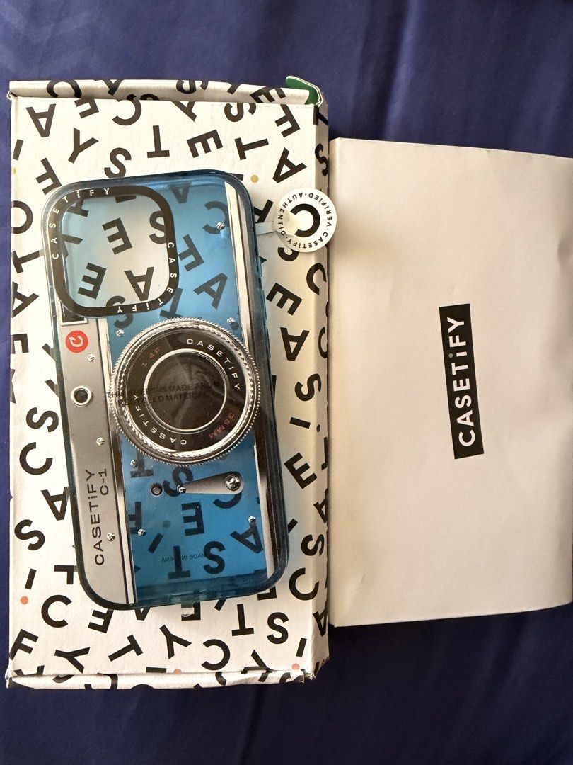 RUSH SALE!!! Casetify Classic Retro Camera iPhone 16 Pro (Category: Cases & Sleeves) located in Manila. Submitted by iamnoyski23 (Listing ID 1457226723, Image 1). Description: Brand: Casetify Model: Classic Retro Camera Color: Blue Compatibility: iPhone 16 Pro Condition: 9/10 (with minimal signs of scratches) Inclusions: box, QR code tag RFS: Phone upgrade MOP: GCash, BDO or BPI.