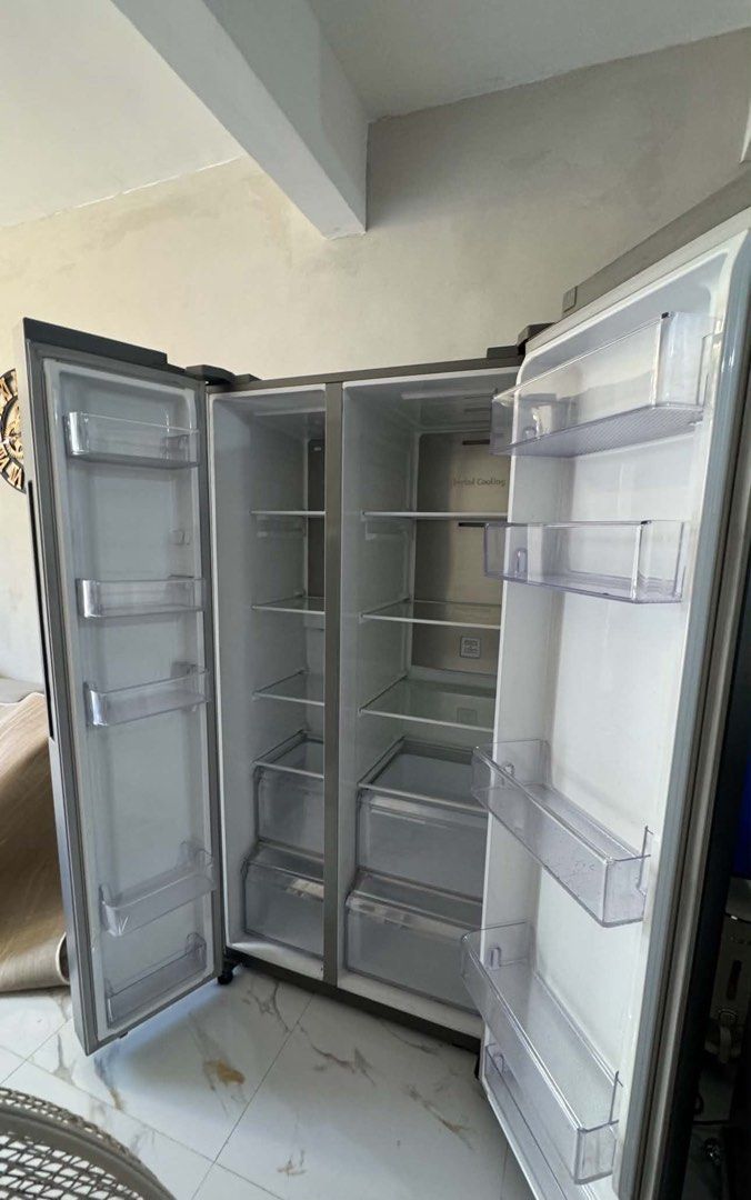 Samsung Side By Side Refrigerator (Category: Refrigerators and Freezers) located in Manila. Submitted by nicsunisa25 (Listing ID 1457184210, Image 3). Description: Preloved Samsung 24.7 cu.ft. Side by Side No Frost Inverter Ref Refrigerator Spacemax Well maintained at 100% energy efficient, sobrang dami malalagay, napakabilis mag palamig at No Frost. Bought last november 2022 & alaga sa linis no repair history Issue: Need to replace motherboard (
