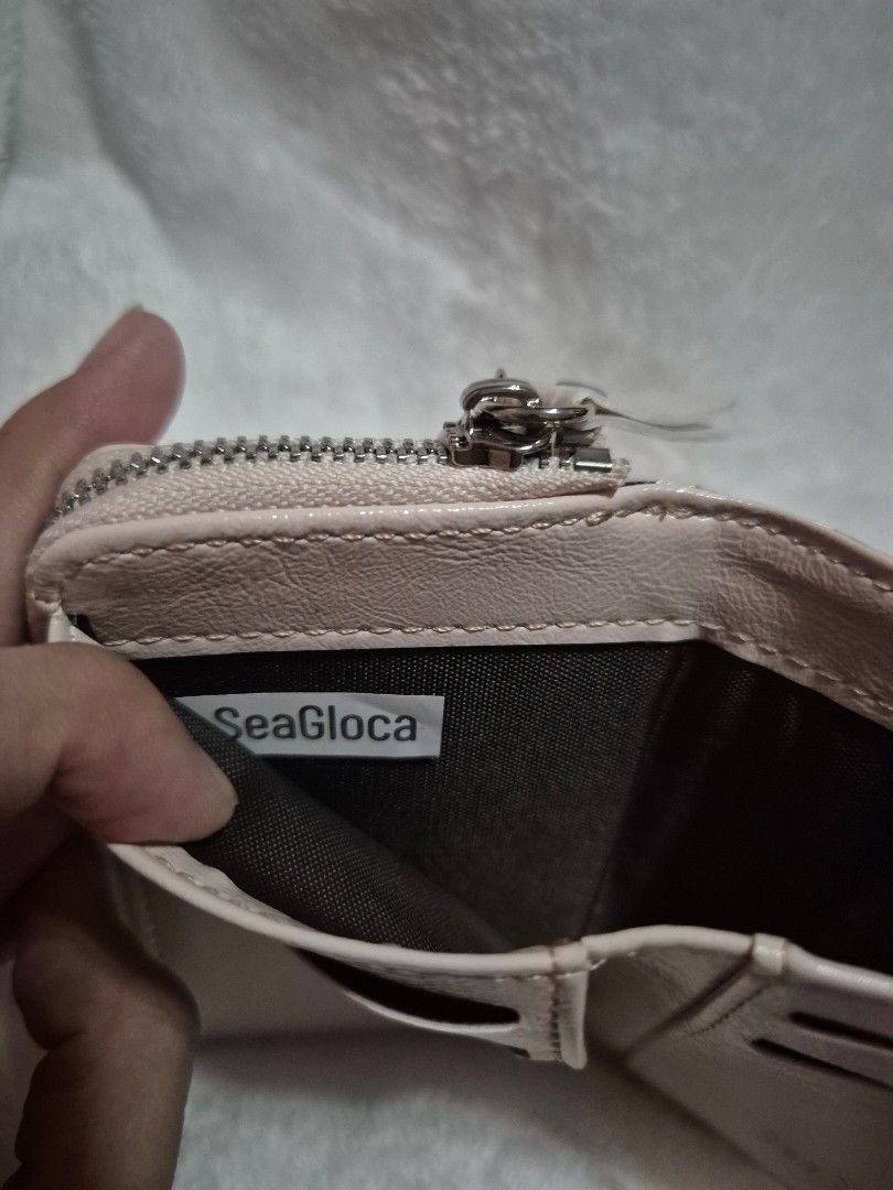 SeaGloca Love Wallet in Pink (Category: Wallets & Card holders) located in Malabon City. Submitted by cerixe (Listing ID 1457263682, Image 3). Description: SeaGloca Love Multi-Card Slot Short Wallet with Zipper Coin Purse for Woman No 26 in Pink 🩷 Really good quality trifold wallet with a snap closure in a glossy faux leather finish. Super pretty in person!! 💕 Originally bought for ₱268 in the orange app (see last photos for screenshots). Only 