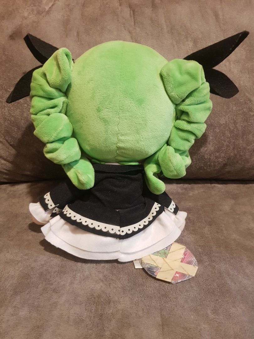 Sega Hatsune Miku plush w tag (Category: Plushies & Soft Toys) located in Quezon City. Submitted by unitednations (Listing ID 1457268370, Image 3). Description: Sega Hatsune Miku plush w tag Authentic Sega Miku collectible merchendise Price: 600Php Dark angel miku, she has green curled twintails in this variant but its still miku, tag is still attatched i just covered it with plastic wrap & tape to protect it. Like new condition, but needs some d