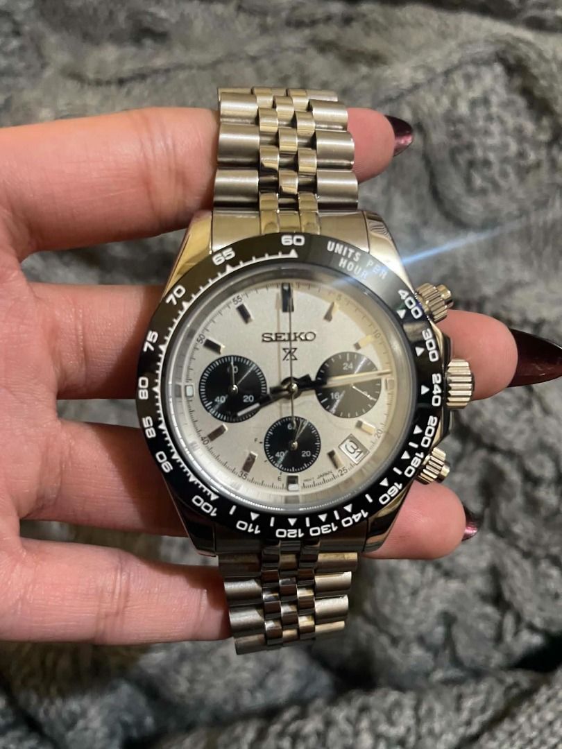Seiko Chronograph Stainless Steel Watch (Category: Men's Watches) located in Baguio. Submitted by shawncruz051966 (Listing ID 1457292807, Image 3). Description: - Seiko Chronograph Mod (Seiko "Panda" style dial) - Durable Stainless Steel Band and Case - Condition: Excellent, clean condition, well-maintained - Elegant Silver Dial with Contrasting Black Sub-dials - Functional Tachymeter Bezel - Precise Chronograph Functionality - Convenient Date Wi