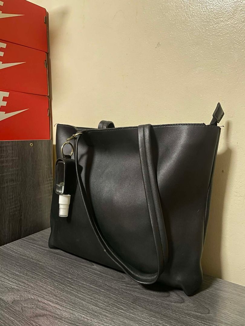 SHOULDER BAG WITH HANDSANITIZER HOLDER (BLACK) (Category: Shoulder Bags) located in Caloocan City. Submitted by chapter_01 (Listing ID 1457189139, Image 3). Description: - No Issues - Good Condition - Good for casual - Negotiable.
