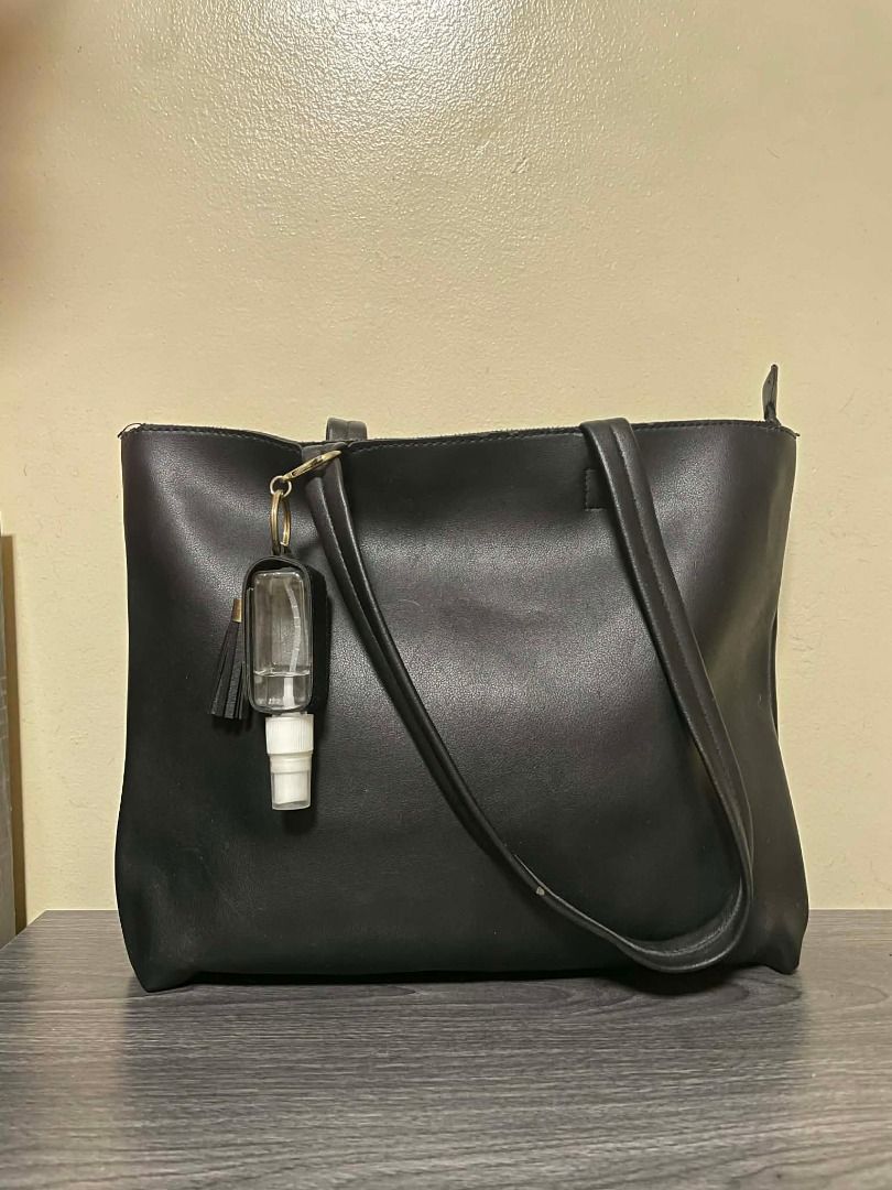 SHOULDER BAG WITH HANDSANITIZER HOLDER (BLACK) (Category: Shoulder Bags) located in Caloocan City. Submitted by chapter_01 (Listing ID 1457189139, Image 1). Description: - No Issues - Good Condition - Good for casual - Negotiable.