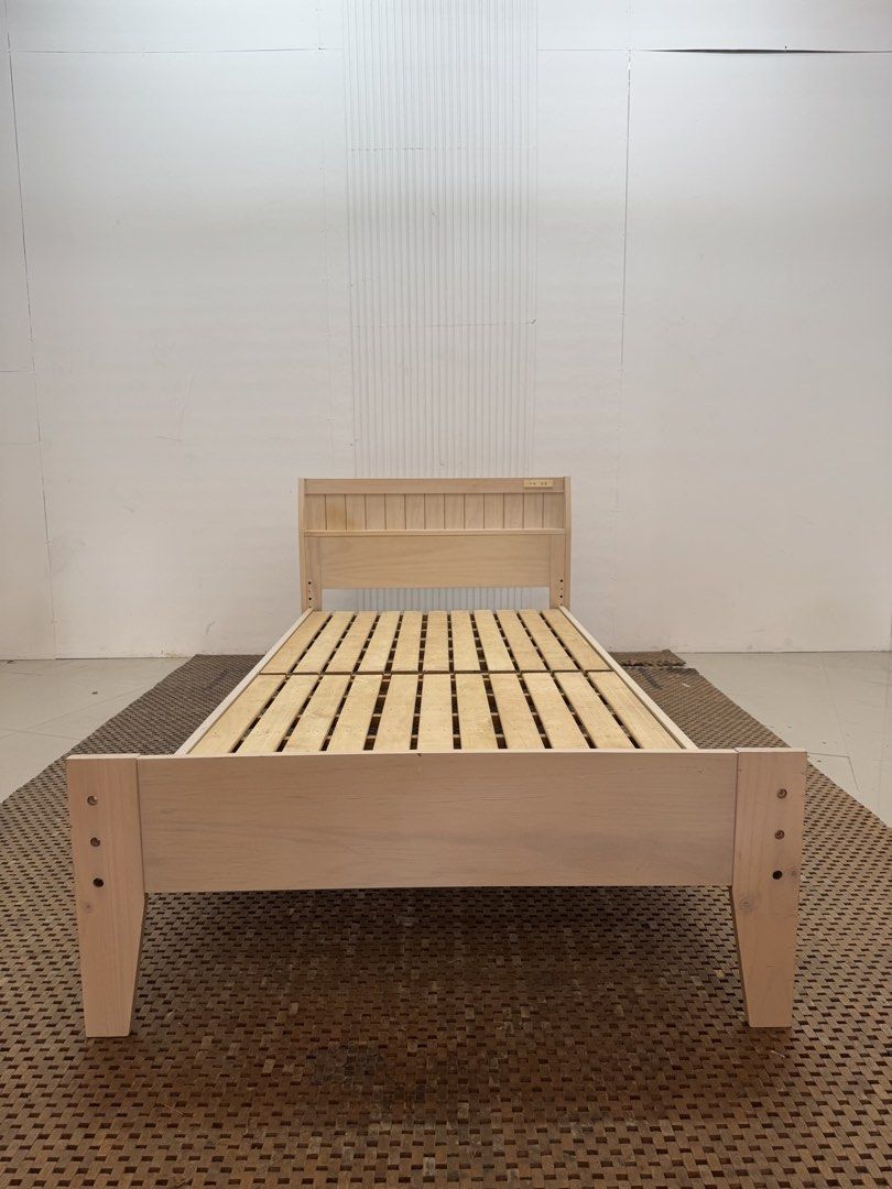 Single bed frame (Category: Bed Frames & Mattresses) located in Quezon City. Submitted by matetdevis13 (Listing ID 1457326891, Image 1). Description: Wooden Platform Single Bed Frame Price: 5,900 38 x 78 x 30.5/11 In good condition Code MJS20-R53.