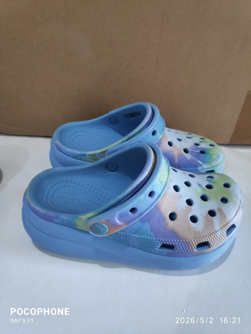 Size C13 Crocs (Category: Slippers and slides) located in Pagsanjan. Submitted by rays-days (Listing ID 1457320249, Image 3). Description: - Blue Crocs clogs with a vibrant tie-dye pattern. - Features the iconic Crocs comfort sole for all-day wear. - Effortless slip-on and slip-off design. - Ideal for everyday casual outings. - Tie-dye colors include blue, purple, and yellow. size C13 pm me meet up around SANTA CRUZ LAGUNA for shipping, buyer wil
