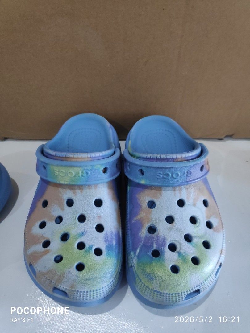 Size C13 Crocs (Category: Slippers and slides) located in Pagsanjan. Submitted by rays-days (Listing ID 1457320249, Image 2). Description: - Blue Crocs clogs with a vibrant tie-dye pattern. - Features the iconic Crocs comfort sole for all-day wear. - Effortless slip-on and slip-off design. - Ideal for everyday casual outings. - Tie-dye colors include blue, purple, and yellow. size C13 pm me meet up around SANTA CRUZ LAGUNA for shipping, buyer wil