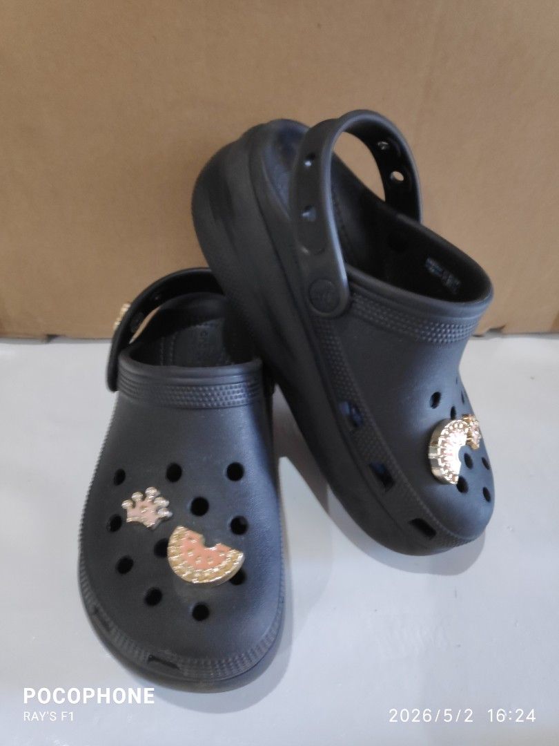 Size J2 Black Crocs (Category: Babies & Kids Fashion) located in Pagsanjan. Submitted by rays-days (Listing ID 1457320126, Image 2). Description: - Black Crocs - Size J2 - Includes cute charms: crown and watermelon slice - Adjustable strap (can be worn up or down) - Ideal for everyday wear original pm me meet up around SANTA CRUZ LAGUNA for shipping, buyer will shoulder the fees.