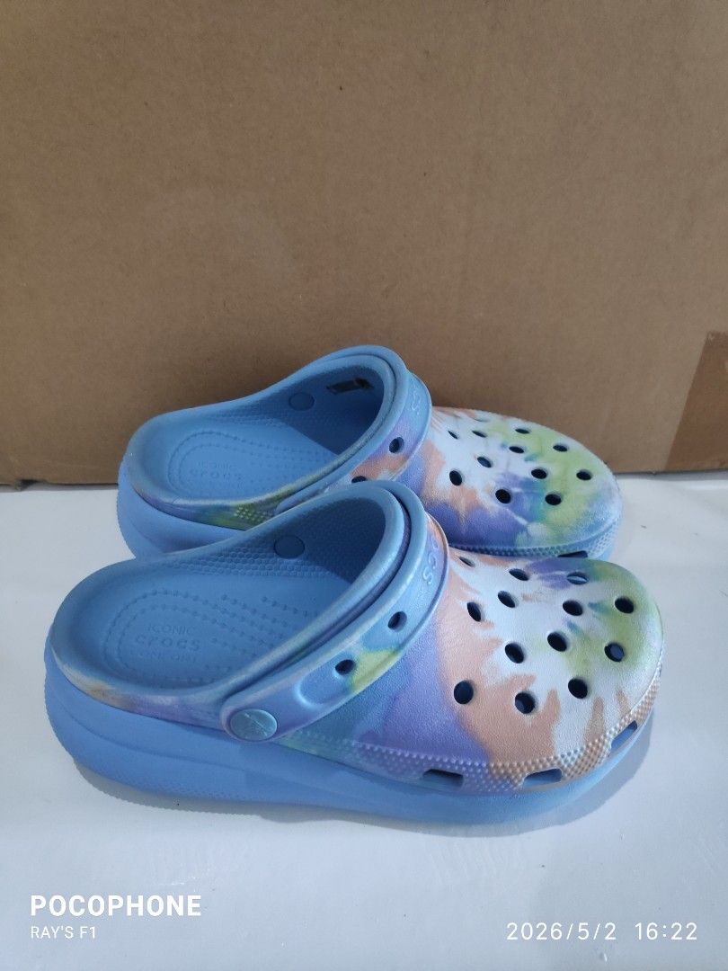 Size J2 Crocs (Category: Slippers and slides) located in Pagsanjan. Submitted by rays-days (Listing ID 1457320209, Image 3). Description: - Blue Crocs clogs with a cool tie-dye pattern. - Features the iconic Crocs design with ventilation holes for breathability. - Light blue soles add a pop of color. - Super easy to slip on and off, making them perfect for everyday casual wear. size J2 pm me meet up around SANTA CRUZ LAGUNA for shipping, buyer wi