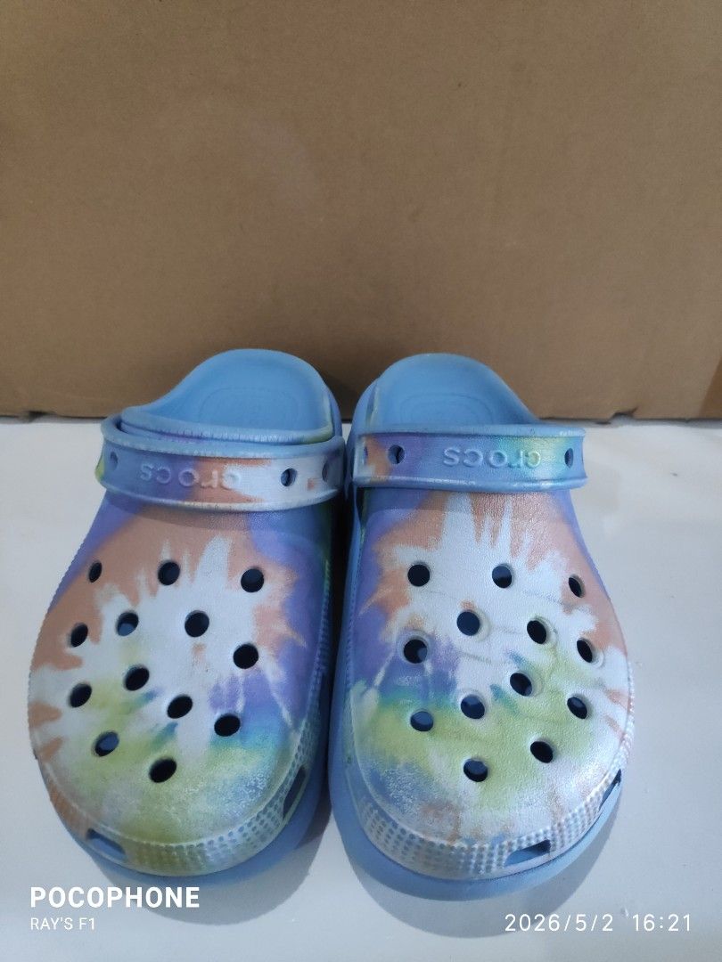 Size J2 Crocs (Category: Slippers and slides) located in Pagsanjan. Submitted by rays-days (Listing ID 1457320209, Image 2). Description: - Blue Crocs clogs with a cool tie-dye pattern. - Features the iconic Crocs design with ventilation holes for breathability. - Light blue soles add a pop of color. - Super easy to slip on and off, making them perfect for everyday casual wear. size J2 pm me meet up around SANTA CRUZ LAGUNA for shipping, buyer wi