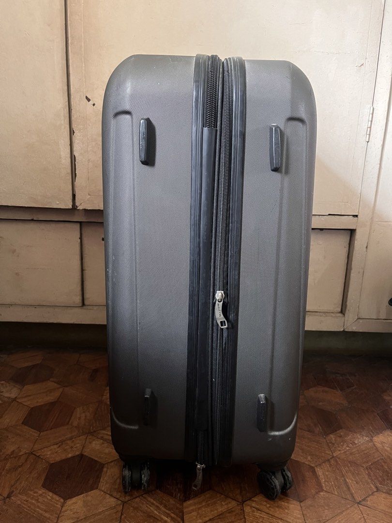 Sky Travel Hard Case Luggage (Category: Luggage) located in Manila. Submitted by themythfs (Listing ID 1457153696, Image 2). Description: - Grey hard case luggage from Sky Travel - Interior straps to secure belongings - Wheels on the bottom for easy transport - Original price: P3,899.75.