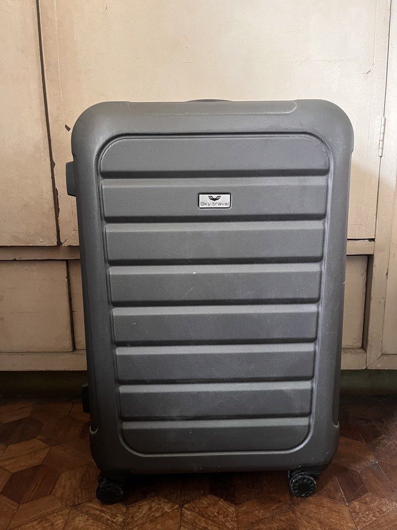 Sky Travel Hard Case Luggage (Category: Luggage) located in Manila. Submitted by themythfs (Listing ID 1457153696, Image 1). Description: - Grey hard case luggage from Sky Travel - Interior straps to secure belongings - Wheels on the bottom for easy transport - Original price: P3,899.75.