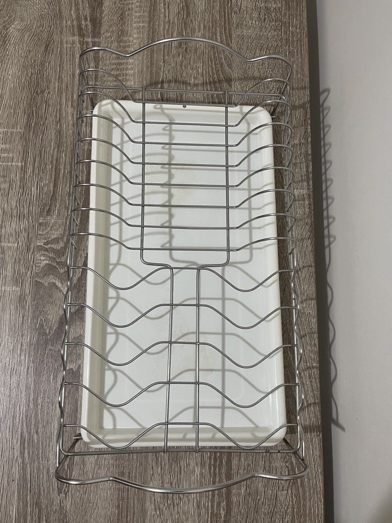 Stainless steel dish rack with plastic tray (Category: Cookware & Accessories) located in Rizal. Submitted by brandonpro74914 (Listing ID 1457316272, Image 2). Description: Used Normal yellowing on white plastic tray For Sale Buyer shoulder’s shipping fee.
