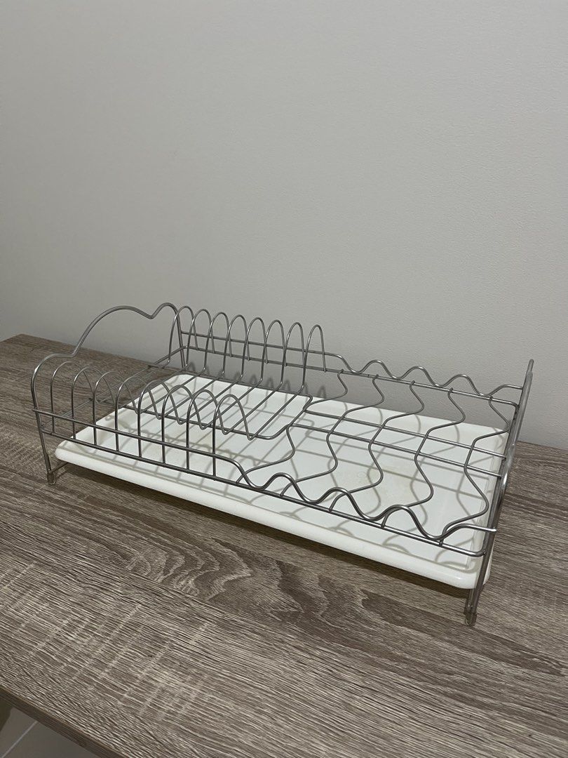 Stainless steel dish rack with plastic tray (Category: Cookware & Accessories) located in Rizal. Submitted by brandonpro74914 (Listing ID 1457316272, Image 1). Description: Used Normal yellowing on white plastic tray For Sale Buyer shoulder’s shipping fee.