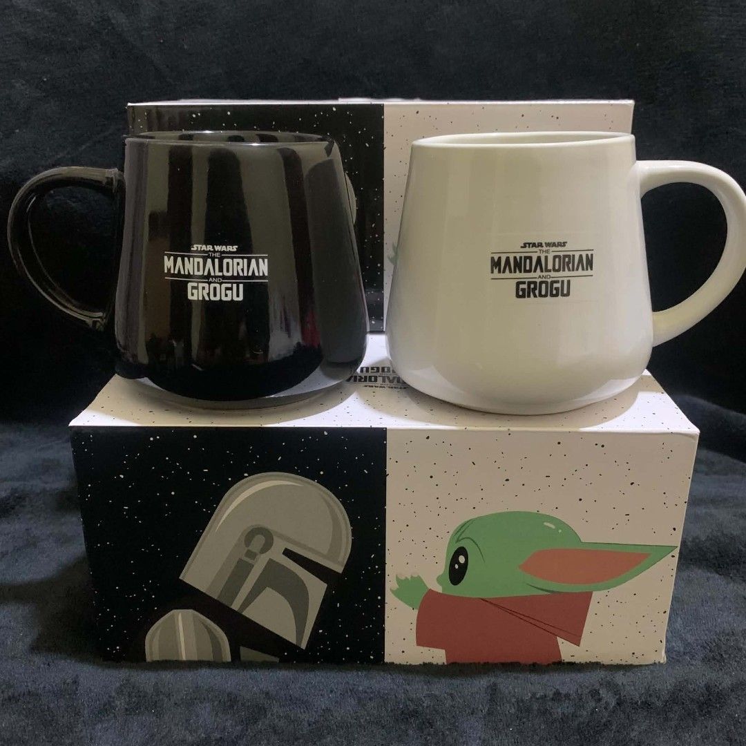 STAR WARS MUG SET (Grogu & Mandalorian) (Category: Other Kitchenware & Tableware) located in Tarlac. Submitted by closetcleanupsale.ph (Listing ID 1457206115, Image 2). Description: Brand New with Box; 6 BOXES AVAILABLE Sold as Set Only; 2 pcs (Mandalorian & Grogu) per box/set; Shiny Finish black & white; NOT BURGER KING!!! NO BRAND!!! 450 per set (2 pcs) ONLY LEFT MAY OR MAY NOT HAVE: MINOR UNNOTICEABLE ISSUES- THE WORDINGS OR PRINT OUTS MAY BE 