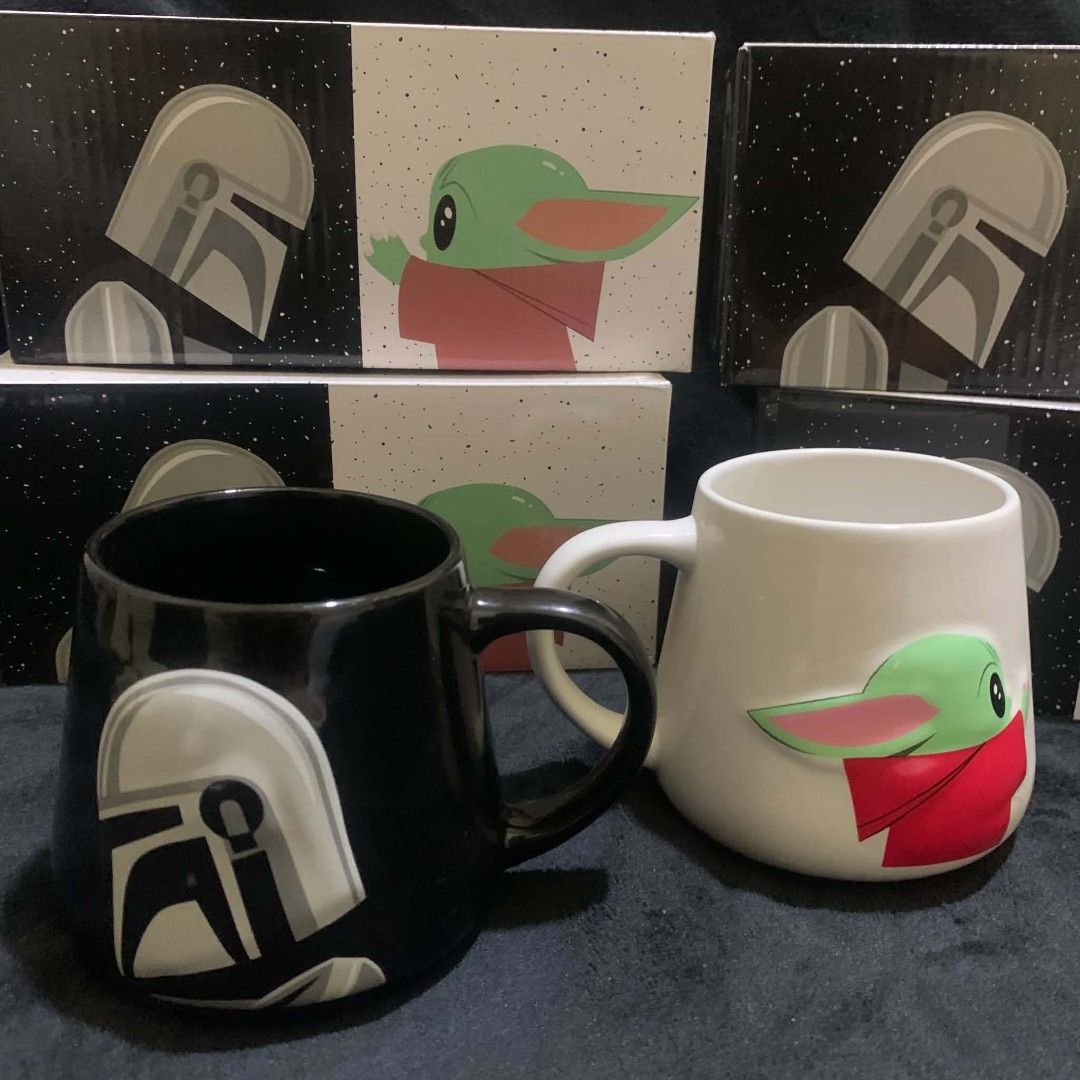 STAR WARS MUG SET (Grogu & Mandalorian) (Category: Other Kitchenware & Tableware) located in Tarlac. Submitted by closetcleanupsale.ph (Listing ID 1457206115, Image 3). Description: Brand New with Box; 6 BOXES AVAILABLE Sold as Set Only; 2 pcs (Mandalorian & Grogu) per box/set; Shiny Finish black & white; NOT BURGER KING!!! NO BRAND!!! 450 per set (2 pcs) ONLY LEFT MAY OR MAY NOT HAVE: MINOR UNNOTICEABLE ISSUES- THE WORDINGS OR PRINT OUTS MAY BE 
