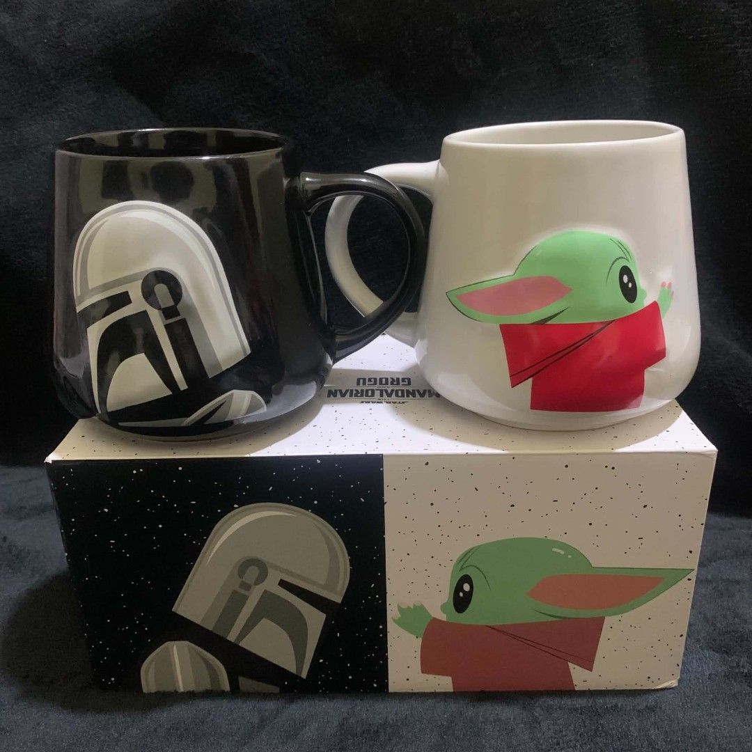 STAR WARS MUG SET (Grogu & Mandalorian) (Category: Other Kitchenware & Tableware) located in Tarlac. Submitted by closetcleanupsale.ph (Listing ID 1457206115, Image 1). Description: Brand New with Box; 6 BOXES AVAILABLE Sold as Set Only; 2 pcs (Mandalorian & Grogu) per box/set; Shiny Finish black & white; NOT BURGER KING!!! NO BRAND!!! 450 per set (2 pcs) ONLY LEFT MAY OR MAY NOT HAVE: MINOR UNNOTICEABLE ISSUES- THE WORDINGS OR PRINT OUTS MAY BE 