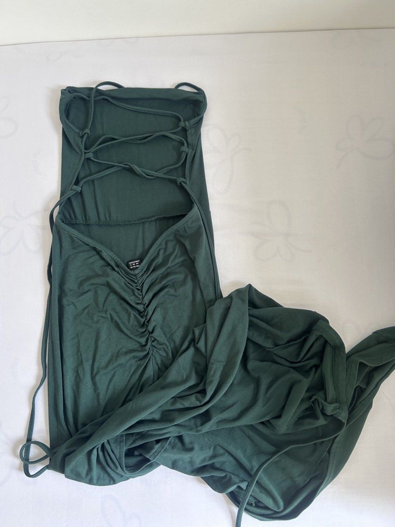 strap backless long dress dark green slit side (Category: Dresses) located in Manila. Submitted by chloemapa (Listing ID 1457188078, Image 3). Description: lace up backless long dress dark green slit side gorgeous and jaw dropping dress! with slit on the side bought this for 638 php used once; no flaws swipe for when worn perfect for going out / night out / date / formal /party rfs: decluttering fits XS-L (stretchy!).