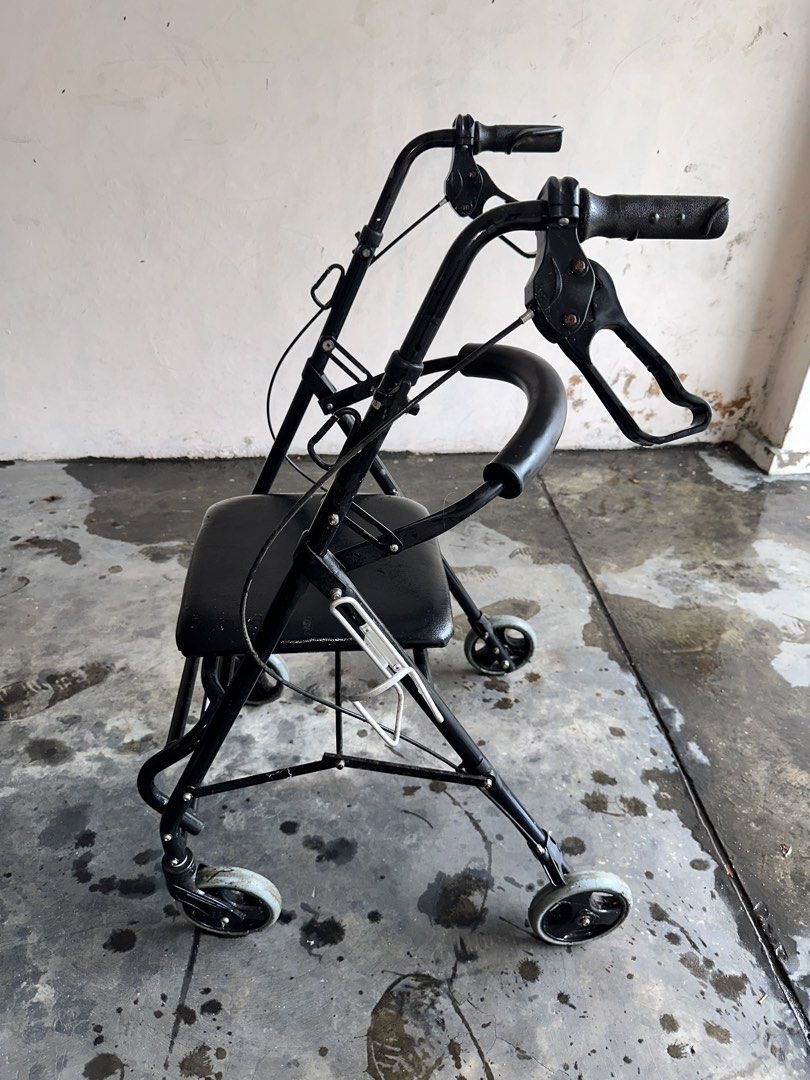 SURRMED Rollator Foldable 4-Wheel Mobility Walker (Category: Wheelchairs) located in Paranaque City. Submitted by syntaxcode (Listing ID 1457147262, Image 2). Description: SURRMED Rollator Foldable 4-Wheel Mobility Walker with Seat & Brakes for Elderly Car Well used 8/10 condition - Used walker with built-in seat - Hand brakes for added safety - Folds for convenient storage - Wheels are intact and functional - Provides excellent mobility assistan