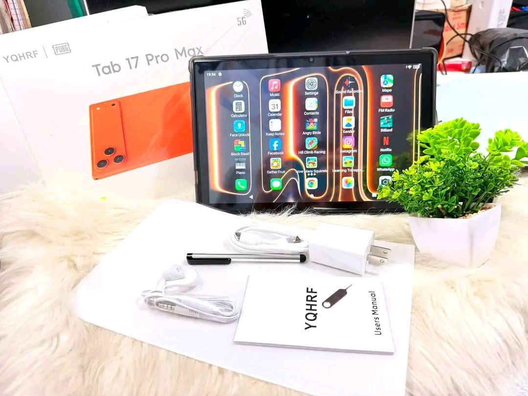 Tablet (Category: Android) located in Manila. Submitted by swiftdeer_8808f2 (Listing ID 1457205878, Image 3). Description: YQHRF Tab 17 Pro Max (5G) - 17-inch screen, vibrant orange. Perfect for gaming & videos. Includes charger, earphones, stylus, and manual. OPEN FOR PICKUP/LALAMOVE/JNT ONLY.