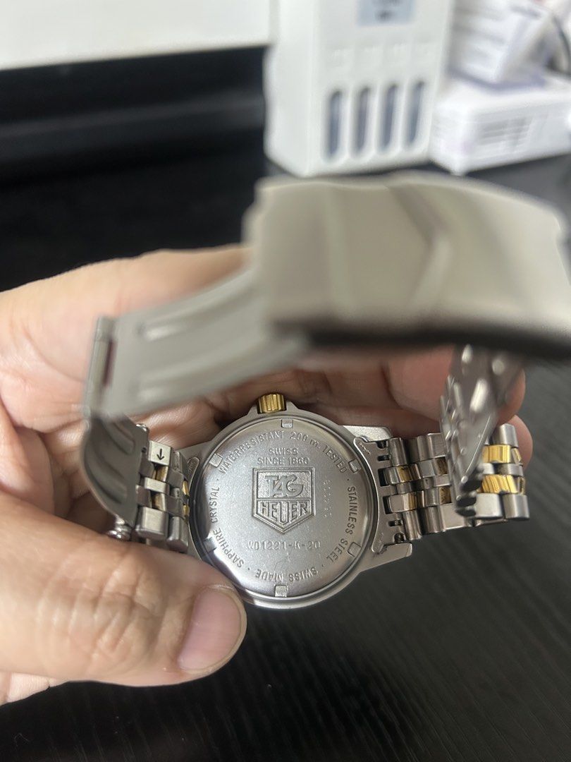 TAG Heuer Professional 200m Two-Tone Watch (Category: Luxury Watches) located in Taguig. Submitted by prelovedby_zia (Listing ID 1457258231, Image 3). Description: - Authentic TAG Heuer Professional Watch - Two-tone Stainless Steel and Gold Bracelet - Date Window at 3 o'clock - Water Resistant 200m - Durable Sapphire Crystal - Swiss Made Quality - Secure Clasp - Minor signs of wear on bracelet -Newly replaced battery - With extra link.