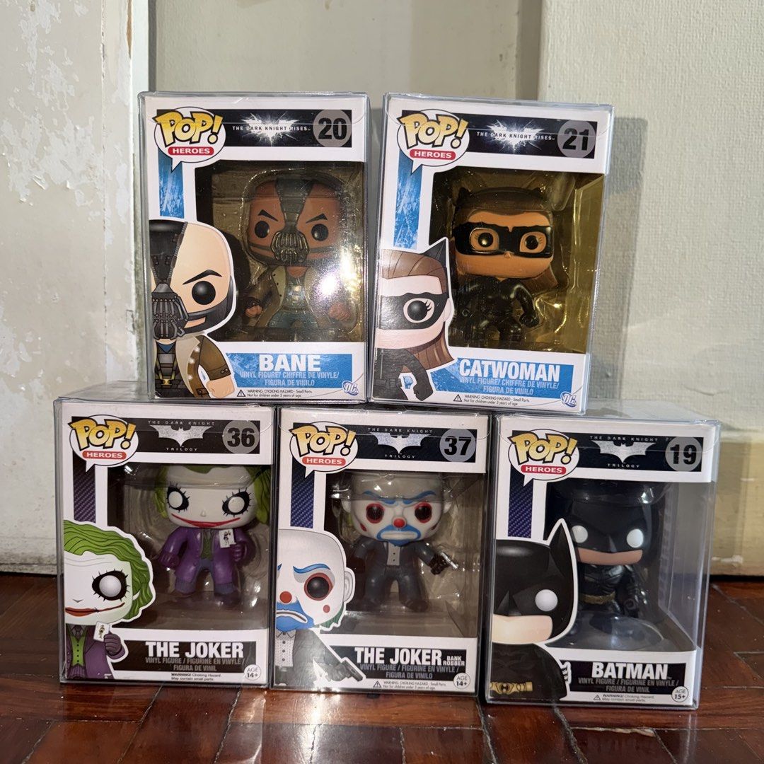 The Dark Knight Funko Pop Set (Category: Designer & Blind Box Toys) located in Pasig City. Submitted by kingclutter (Listing ID 1457224027, Image 1). Description: 7.5-9/10 box conditions. All with used boss protectors. Bane Funko Pop Catwoman Funko Pop The Joker Funko Pop Batman Funko Pop The Joker Bank Robber Funko Pop.