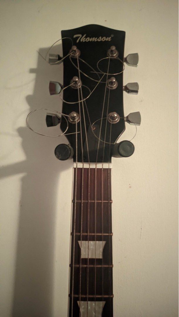 Thomson Electric Guitar - Red (Category: Musical Instruments) located in Manila. Submitted by anotheroneofone (Listing ID 1457202132, Image 3). Description: - Red electric guitar - Les Paul style body - there are rust - Minor scuffs on body - Needs new strings - negotiable.