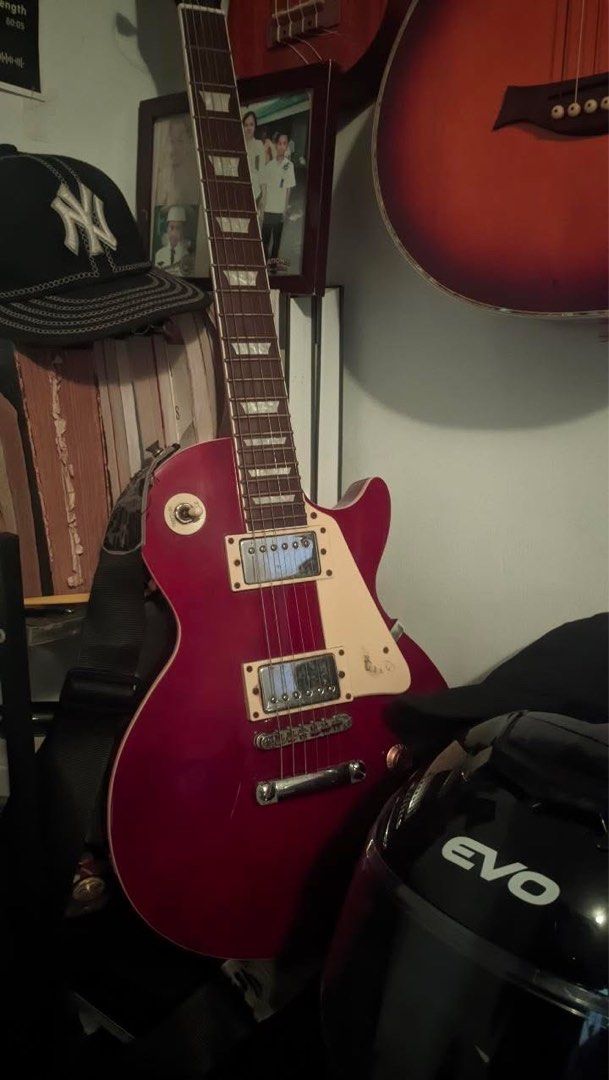 Thomson Electric Guitar - Red (Category: Musical Instruments) located in Manila. Submitted by anotheroneofone (Listing ID 1457202132, Image 1). Description: - Red electric guitar - Les Paul style body - there are rust - Minor scuffs on body - Needs new strings - negotiable.