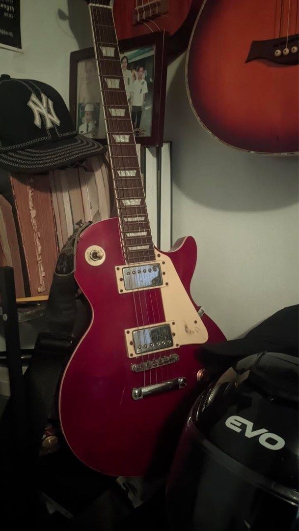Thomson Electric Guitar - Red (Category: Musical Instruments) located in Manila. Submitted by anotheroneofone (Listing ID 1457202132, Image 2). Description: - Red electric guitar - Les Paul style body - there are rust - Minor scuffs on body - Needs new strings - negotiable.