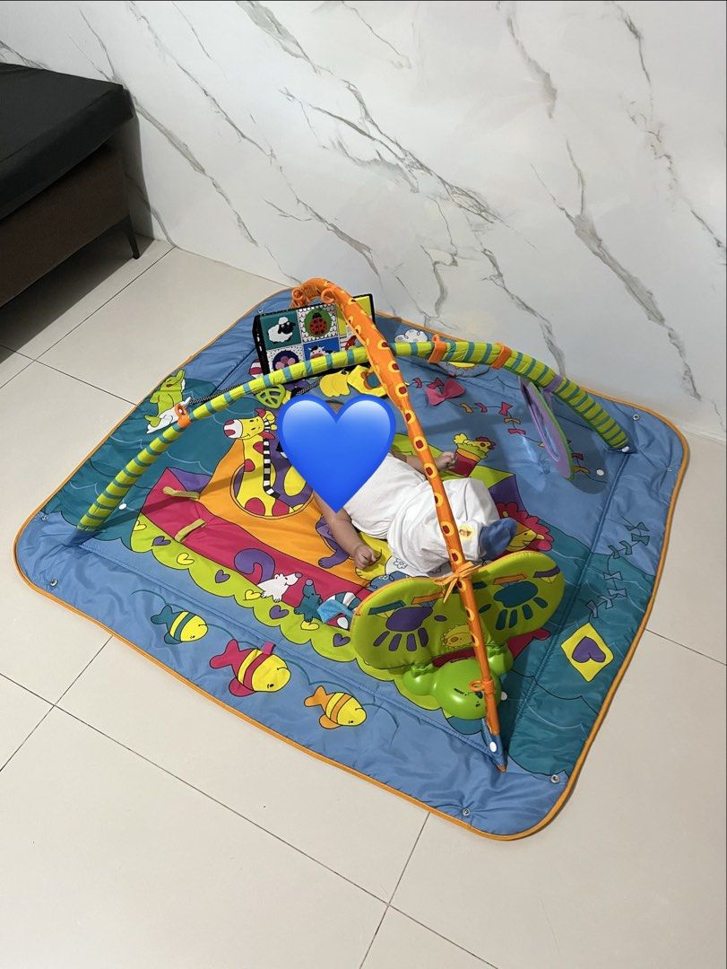 Tiny Love Play Gym (Category: Infant Playtime) located in Rodriguez. Submitted by aubreysee (Listing ID 1457309358, Image 2). Description: - Fun play gym for babies - Colorful waterproof sensory mat - Overhead arch with hanging toys for reaching and grabbing - Ideal for tummy time and sensory development - four corners can be enclosed - Easy to set up and store - has music and lights Used only a few times since we moved and didn’t have space but 